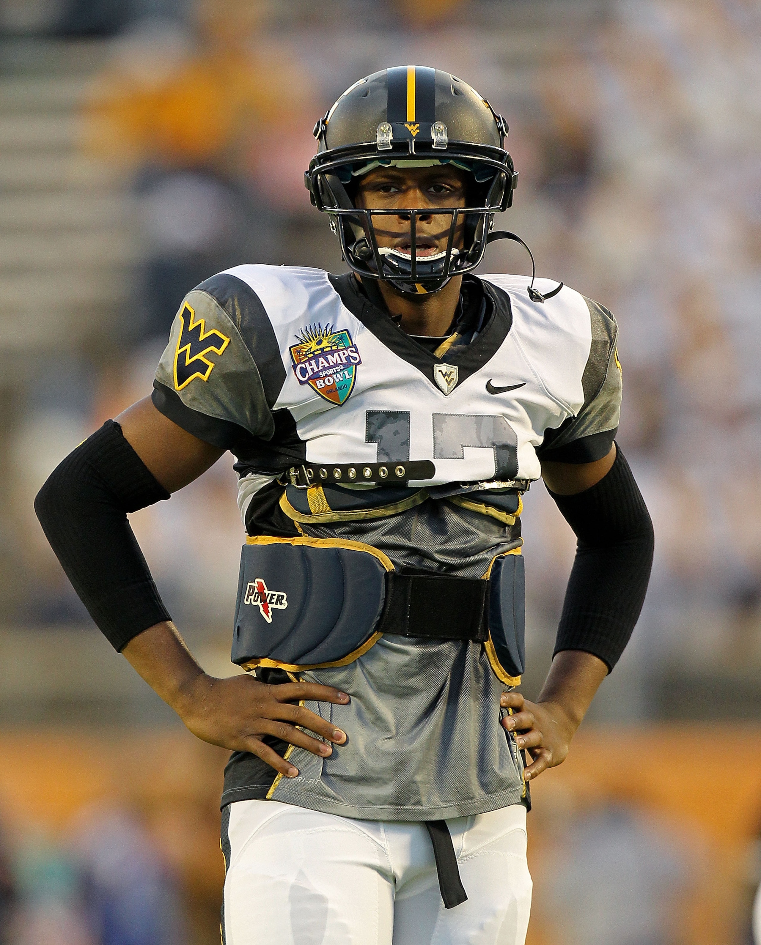 ORLANDO, FL - DECEMBER 28: Geno Smith #12 of the West Virginia Mountineers warms up during the Champs Sports Bowl against the North Carolina State Wolfpack at Florida Citrus Bowl Stadium on December 28, 2010 in Orlando, Florida. (Photo by Mike Ehrmann/G ORLANDO, FL - DECEMBER 28: Geno Smith #12 of the West Virginia Mountineers warms up during the Champs Sports Bowl against the North Carolina State Wolfpack at Florida Citrus Bowl Stadium on December 28, 2010 in Orlando, Florida. (Photo by Mike Ehrmann/G