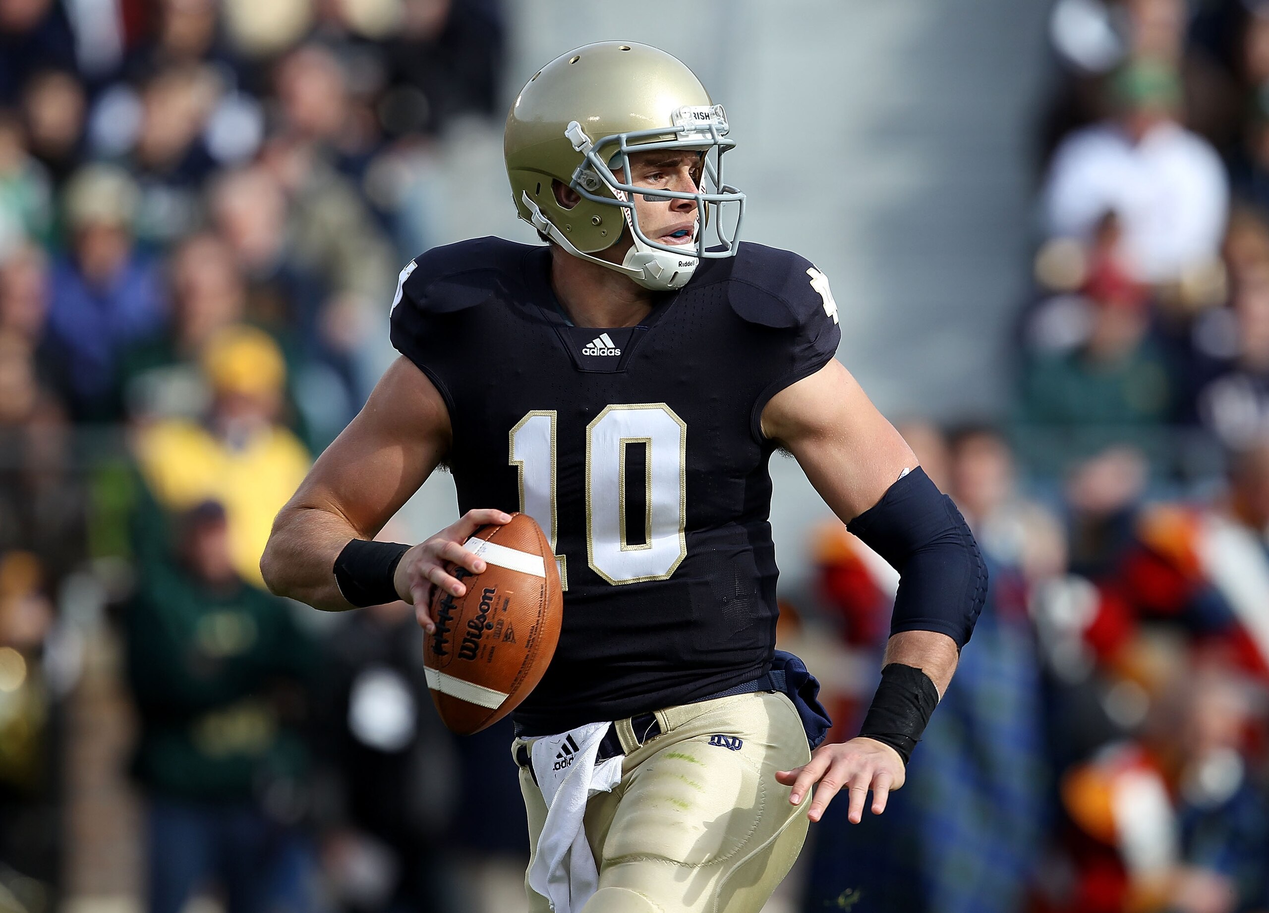 SOUTH BEND, IN - OCTOBER 30: Dayne Crist #10 of the Notre Dame Fighting Irish looks for a receiver against the Tulsa Golden Hurricane at Notre Dame Stadium on October 30, 2010 in South Bend, Indiana. Tulsa defeated Notre Dame 28-27. (Photo by Jonathan Dan SOUTH BEND, IN - OCTOBER 30: Dayne Crist #10 of the Notre Dame Fighting Irish looks for a receiver against the Tulsa Golden Hurricane at Notre Dame Stadium on October 30, 2010 in South Bend, Indiana. Tulsa defeated Notre Dame 28-27. (Photo by Jonathan Dan