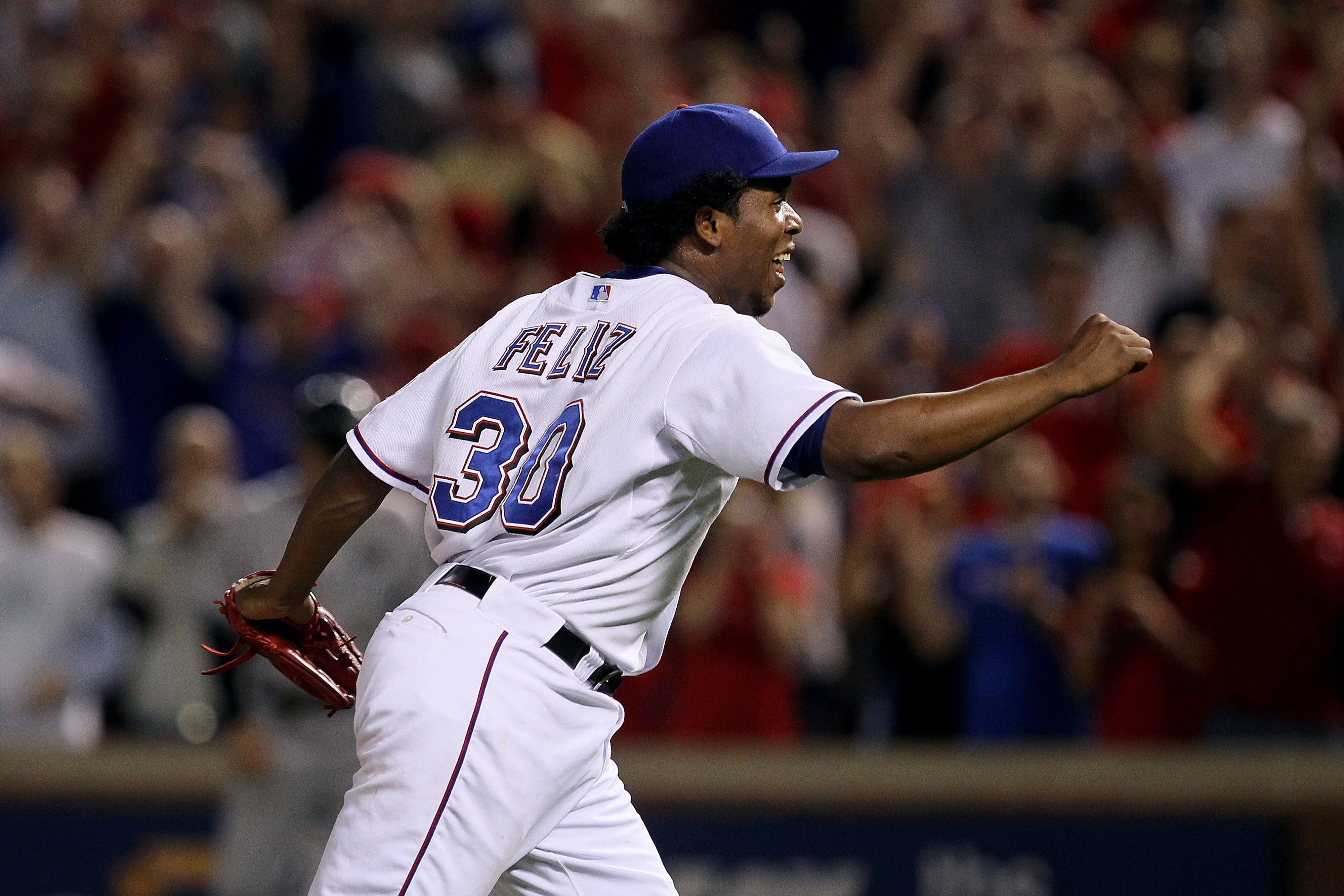 ARLINGTON, TX - OCTOBER 22:  Neftali Feliz #30 of the Texas Rangers celebrates after defeating the New York Yankees  6-1 in Game Six of the ALCS during the 2010 MLB Playoffs at Rangers Ballpark in Arlington on October 22, 2010 in Arlington, Texas.  (Photo