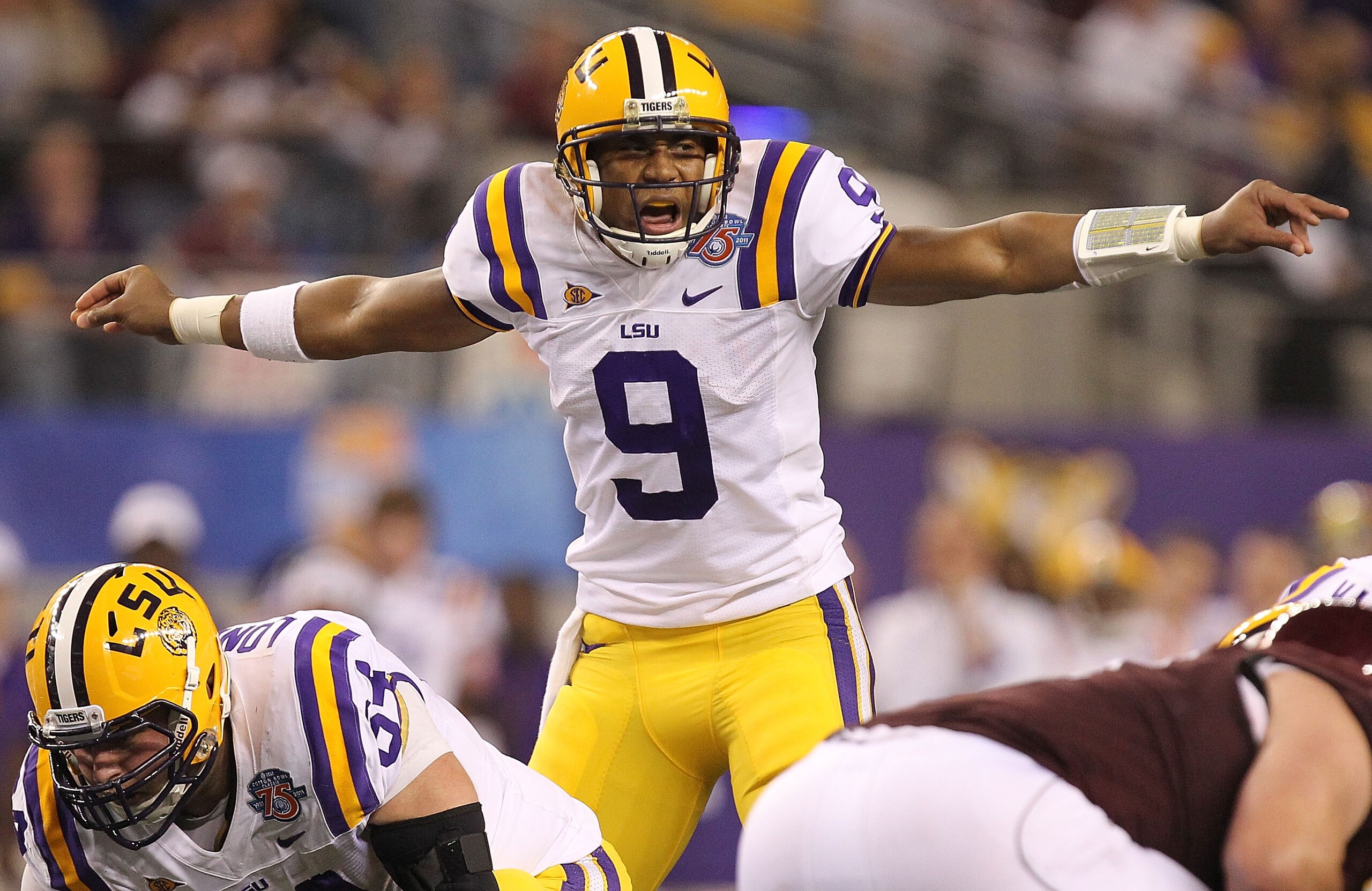 ARLINGTON, TX - JANUARY 07: Quarterback Jordan Jefferson #9 of the LSU Tigers call a play against the Texas A&M Aggies during the AT&T Cotton Bowl at Cowboys Stadium on January 7, 2011 in Arlington, Texas. (Photo by Ronald Martinez/Getty Images) ARLINGTON, TX - JANUARY 07: Quarterback Jordan Jefferson #9 of the LSU Tigers call a play against the Texas A&M Aggies during the AT&T Cotton Bowl at Cowboys Stadium on January 7, 2011 in Arlington, Texas. (Photo by Ronald Martinez/Getty Images)