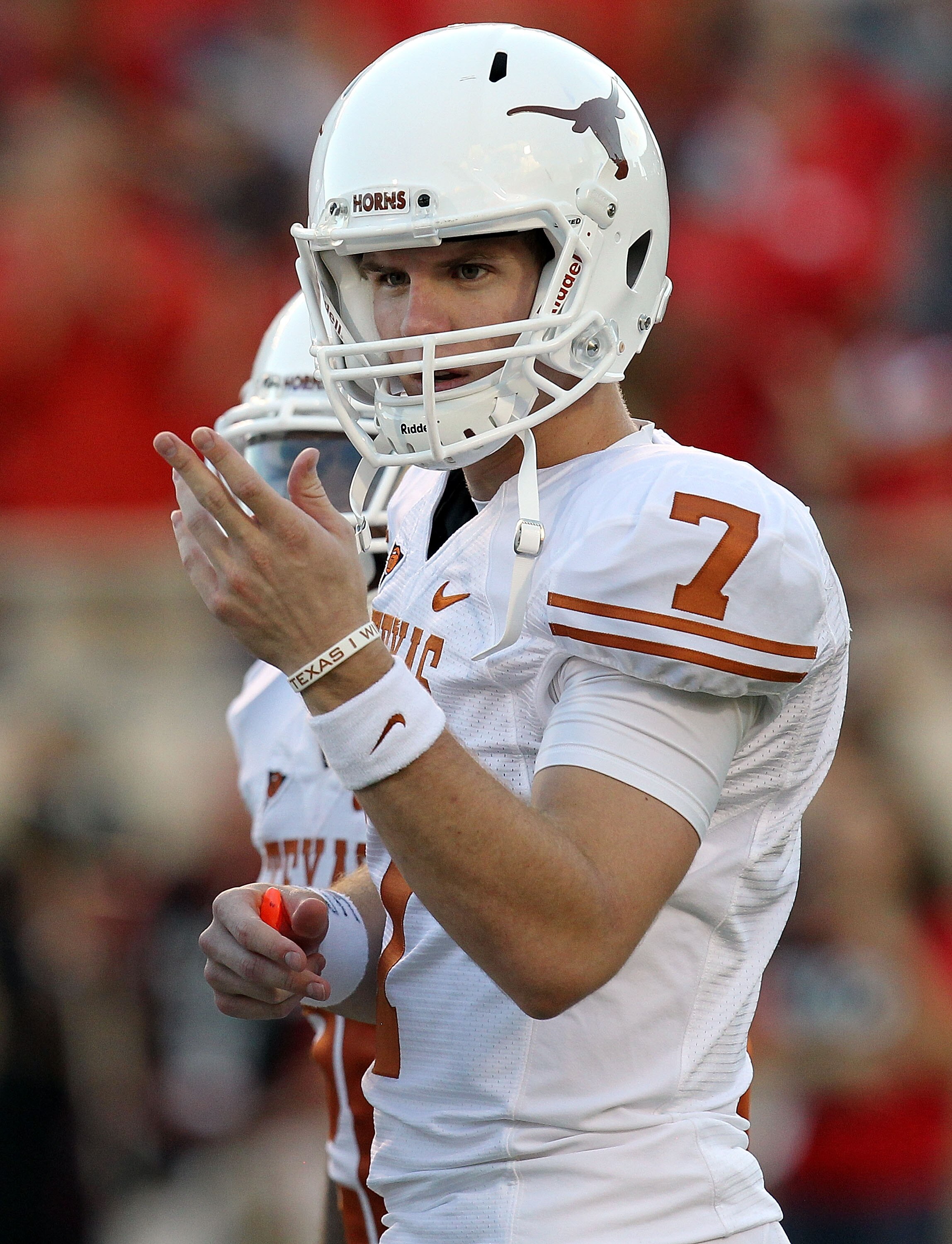 LUBBOCK, TX - SEPTEMBER 18:  Quarterback Garrett Gilbert #7 of the Texas Longhorns at Jones AT&T Stadium on September 18, 2010 in Lubbock, Texas.  (Photo by Ronald Martinez/Getty Images)