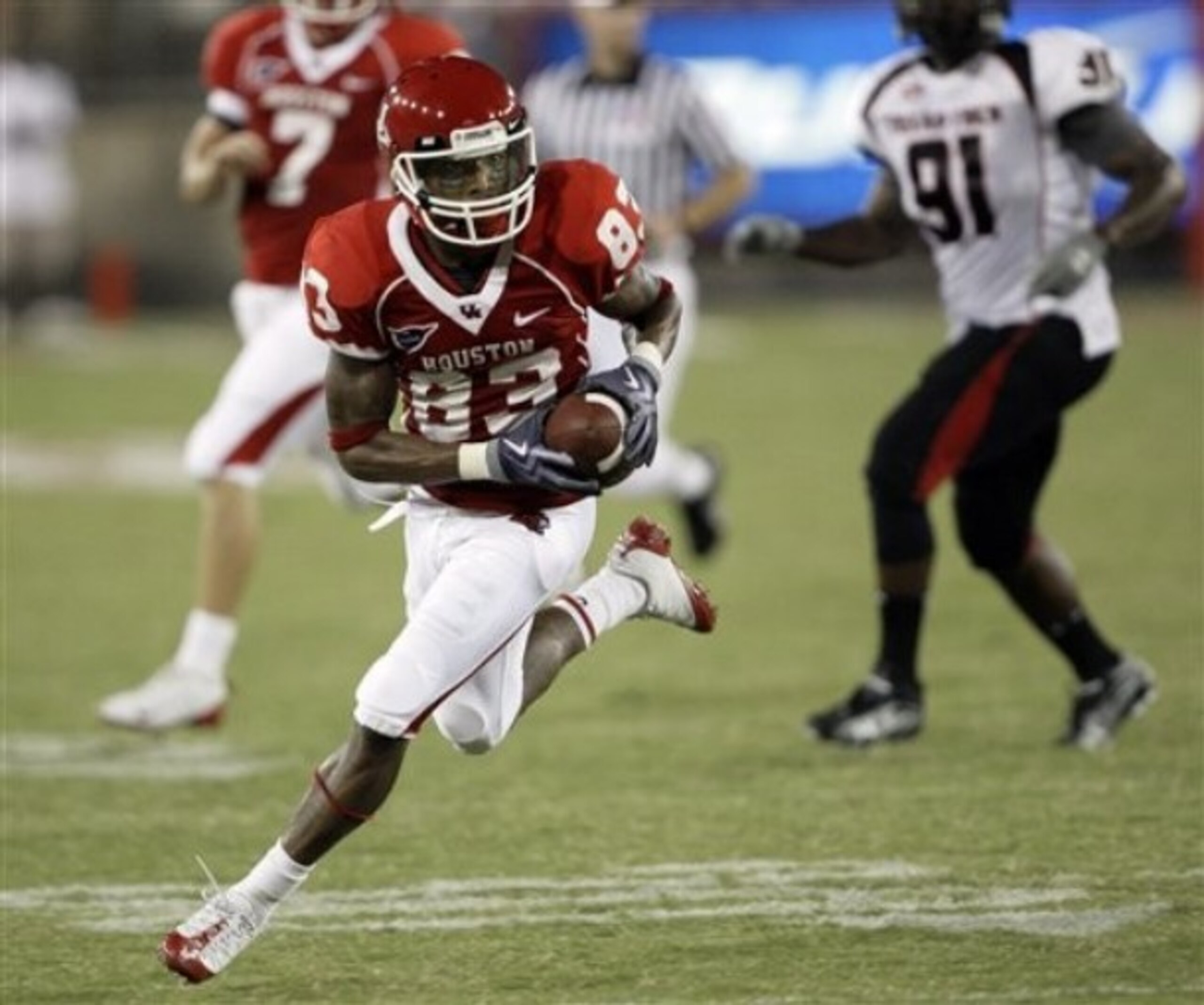 WR Patrick Edwards is one happy Cougar since quarterback Case Keenum will return for another season in 2011.