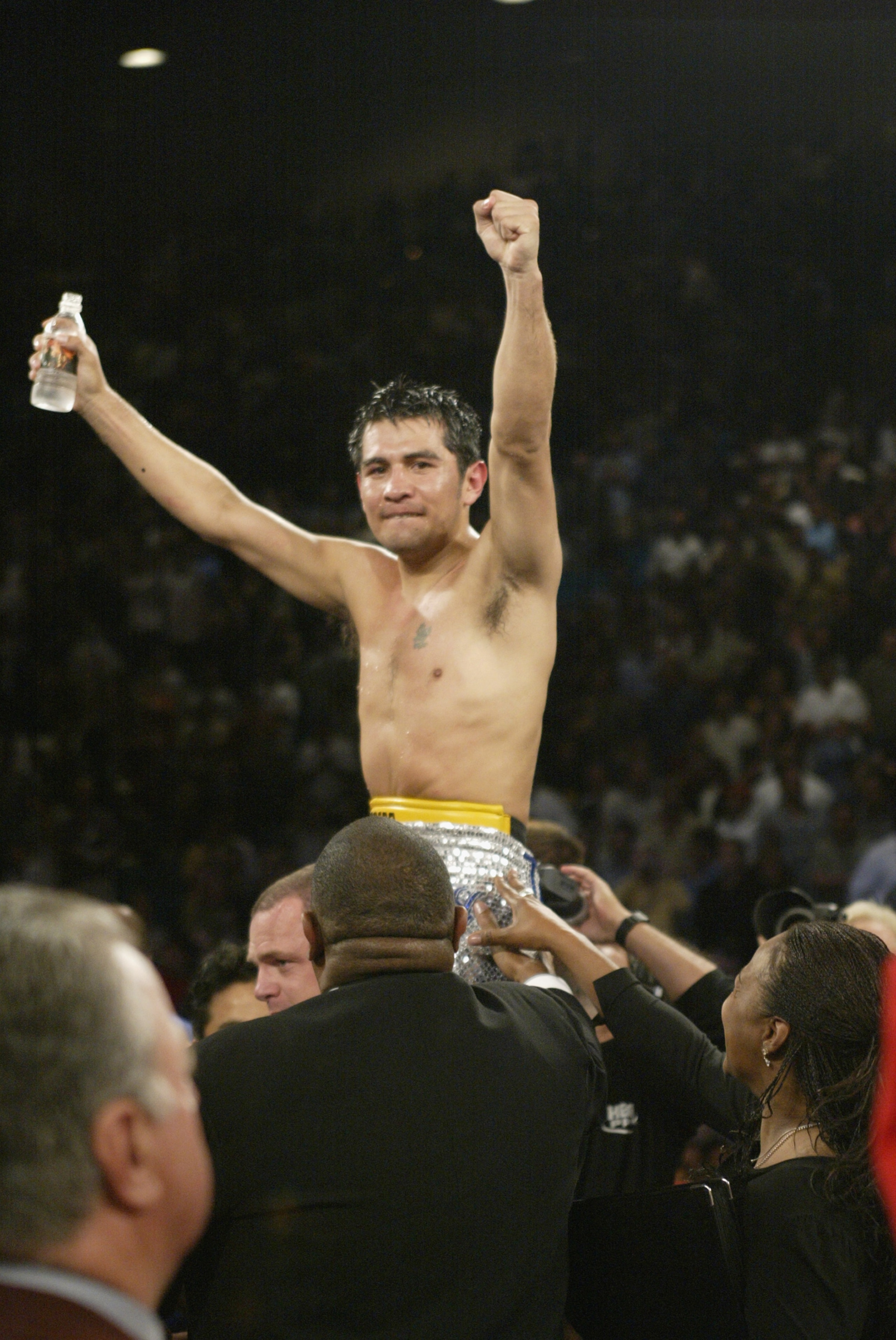 Las Vegas - June 22:  Marco Antonio Barrera celebrates his victory over  Erik Morales after their World Featherweight Championship fight on June 22, 2002 at the MGM Grand Hotel/Casino in Las Vegas. (Photo by Jed Jacobsohn/Getty Images)
