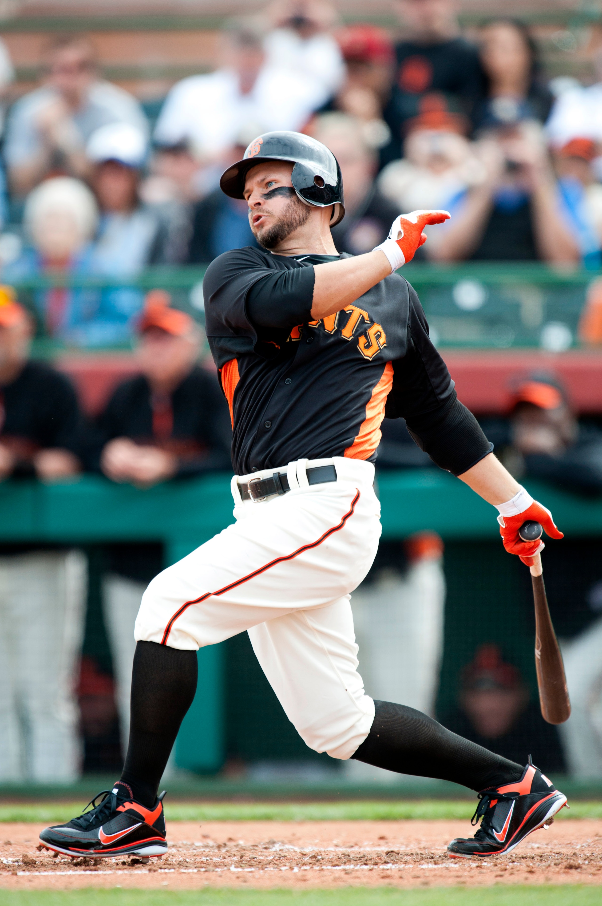 SCOTTSDALE, AZ - FEBRUARY 25: Cody Ross #13 of the San Francisco Giants bats during a spring training game against the Arizona Diamondbacks at Scottsdale Stadium on February 25, 2011 in Scottsdale, Arizona. (Photo by Rob Tringali/Getty Images)