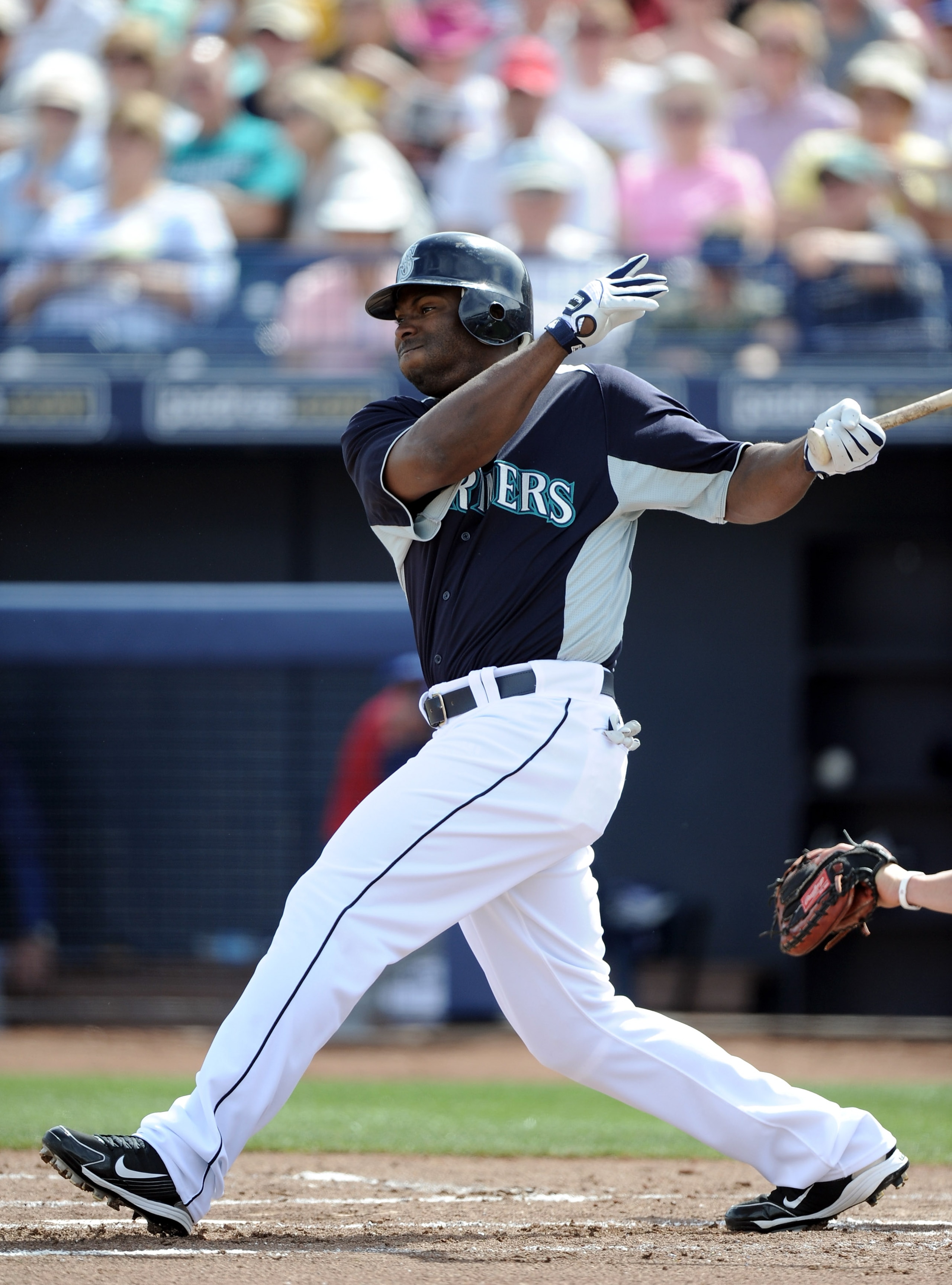 PEORIA, AZ - MARCH 01:  Milton Bradley #15 of the  Seattle Mariners at bat against the Texas Rangers during spring training at Peoria Stadium on March 1, 2011 in Peoria, Arizona.  (Photo by Harry How/Getty Images)