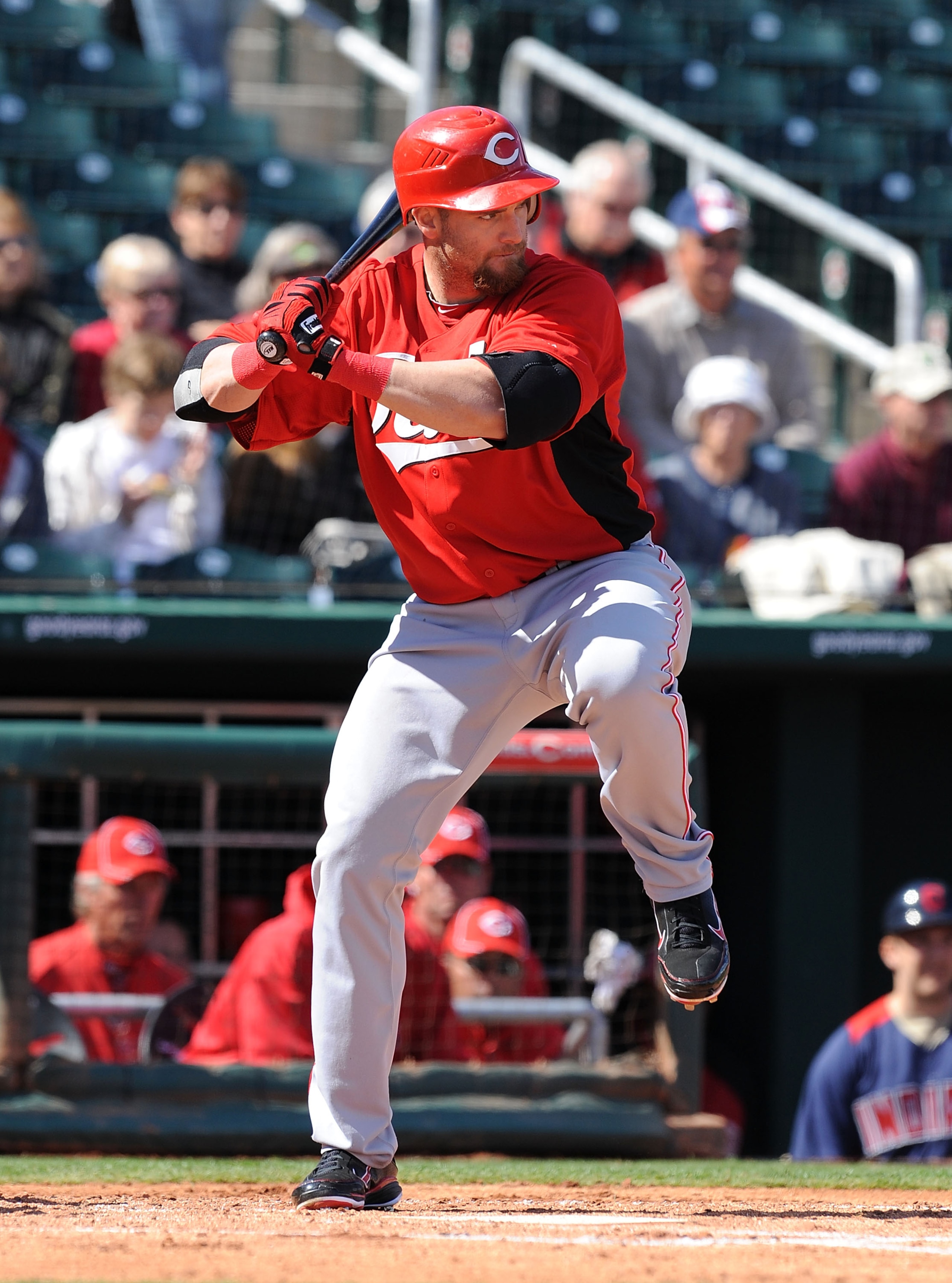 GOODYEAR, AZ - FEBRUARY 27:  Jonny Gomes #31 of the Cincinnati Reds takes an at bat against the Cleveland Indians at Goodyear Ballpark on February 27, 2011 in Goodyear, Arizona.  (Photo by Norm Hall/Getty Images)