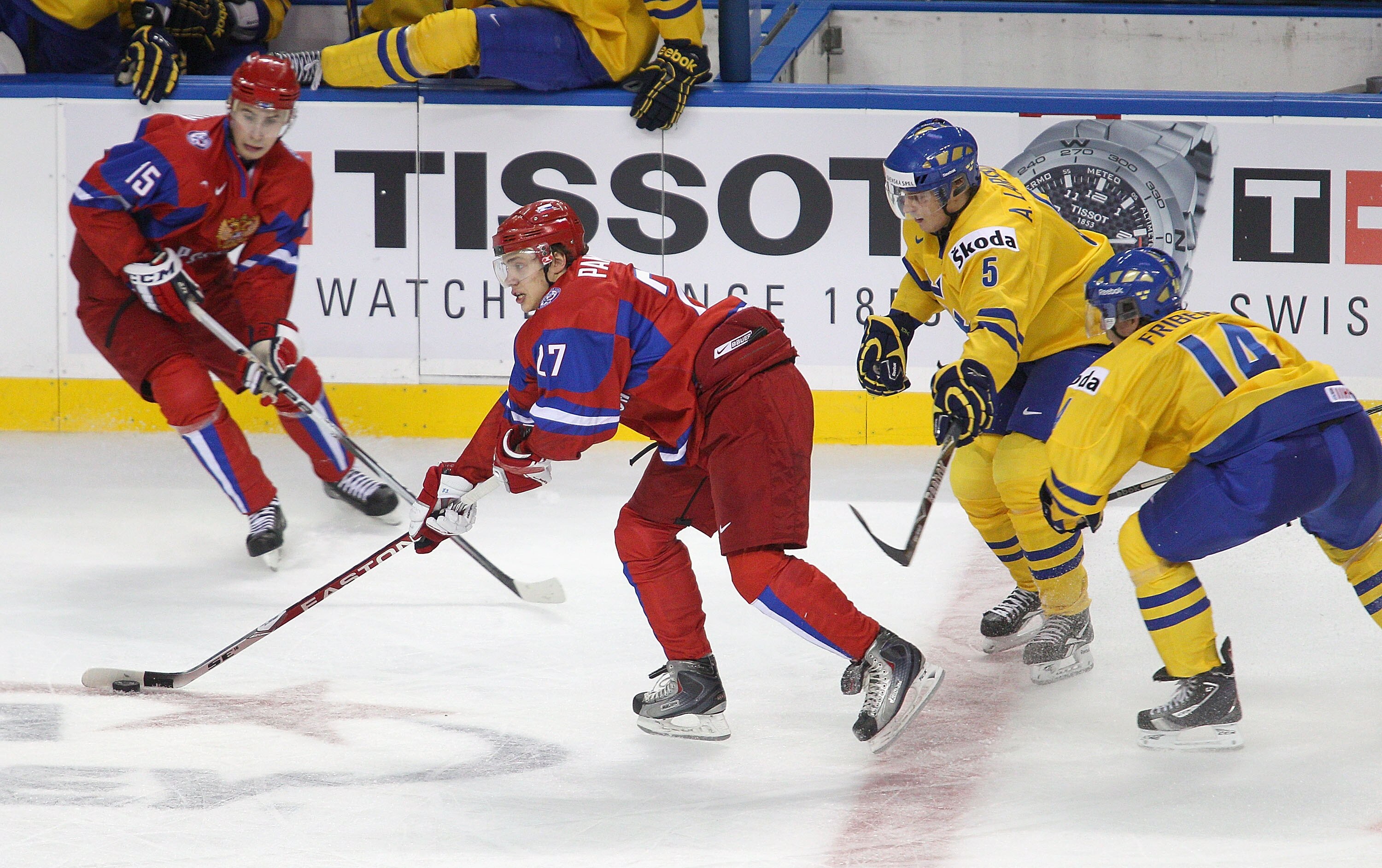 BUFFALO, NY - JANUARY 03: Artemi Panarin #27 and Artyom Voronin #15  of Russia skate against Adam Larsson #5 and Max Friberg #14 of  Sweden during the 2011 IIHF World U20 Championship Semi Final game between Sweden and Russia on January 3, 2011 in Buffalo