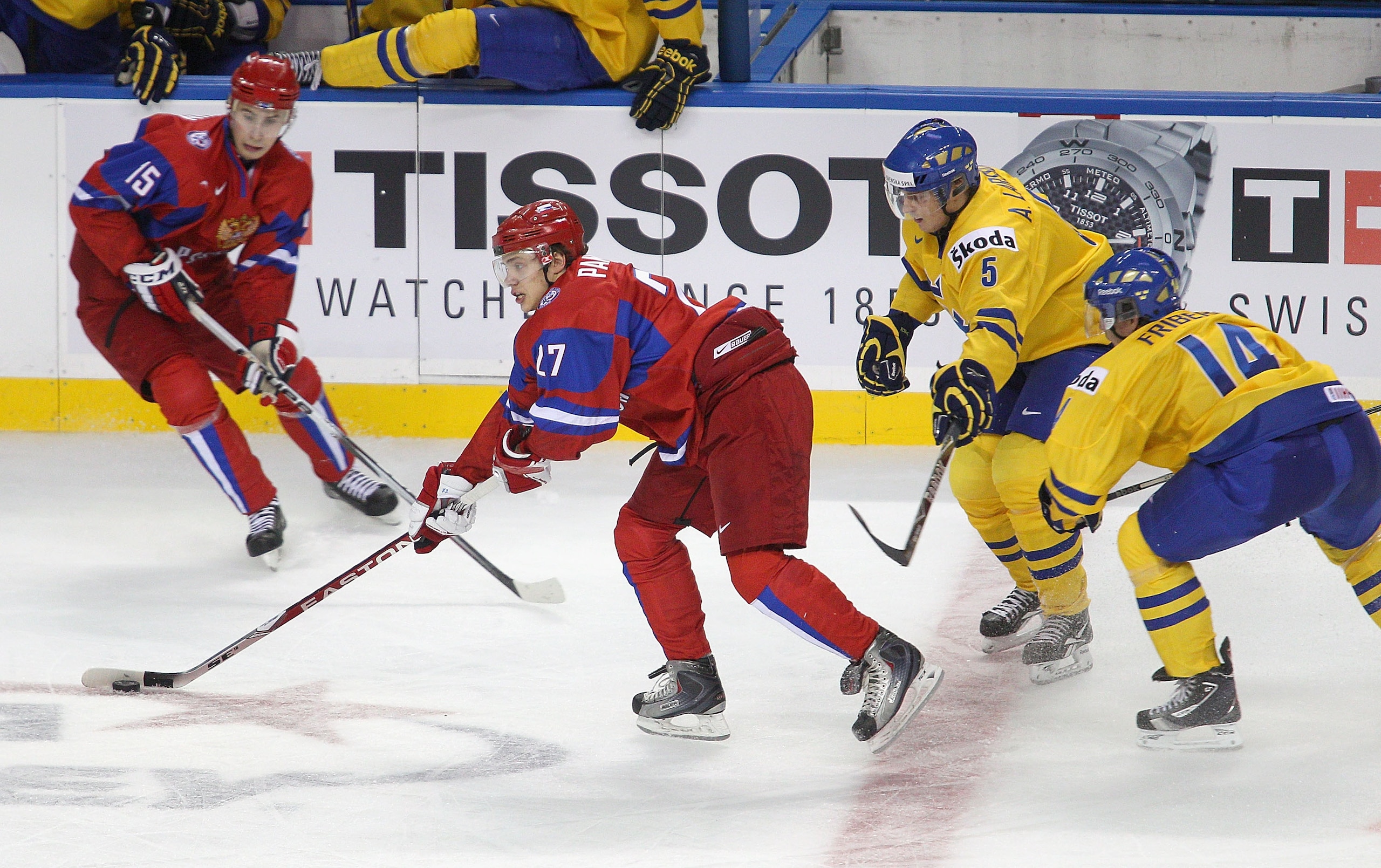 BUFFALO, NY - JANUARY 03: Artemi Panarin #27 and Artyom Voronin #15  of Russia skate against Adam Larsson #5 and Max Friberg #14 of  Sweden during the 2011 IIHF World U20 Championship Semi Final game between Sweden and Russia on January 3, 2011 in Buffalo