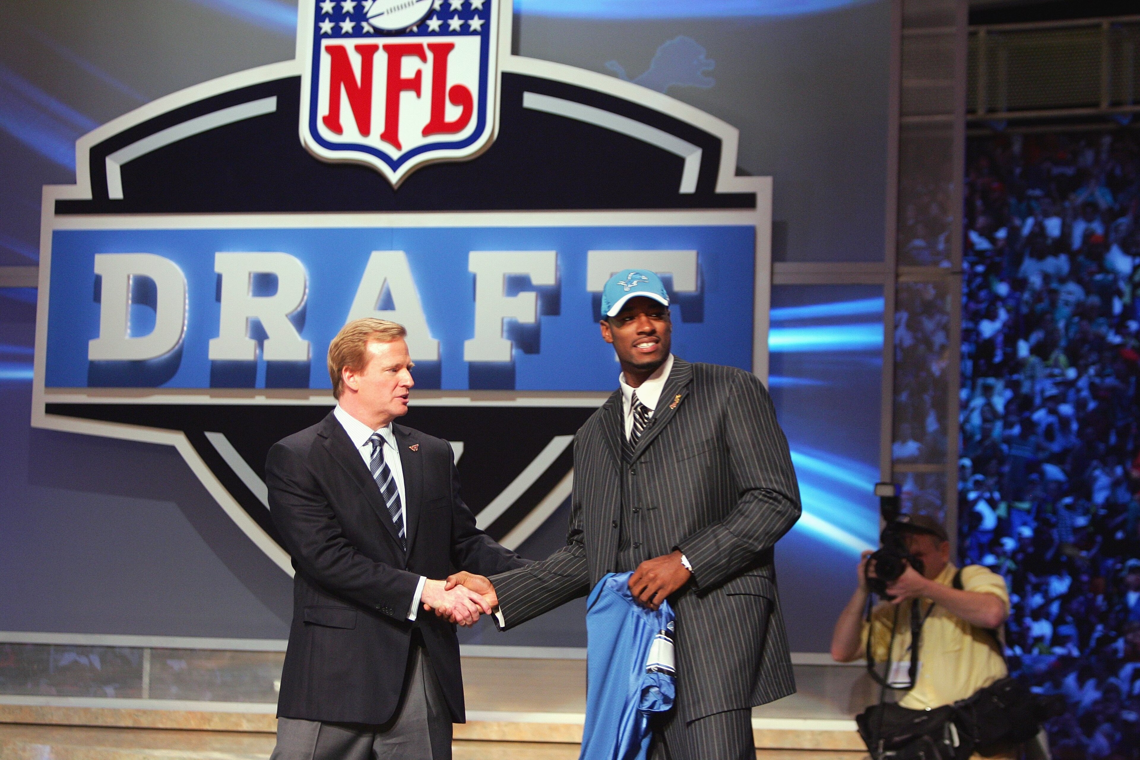 NEW YORK - APRIL 28:  Wide receiver Calvin Johnson of Georgia Tech shakes hands with NFL Commissioner Roger Goodell after being drafted by the Detroit Lions during the 2007 NFL Draft on April 28, 2007 at Radio City Music Hall in New York, New York. (Photo