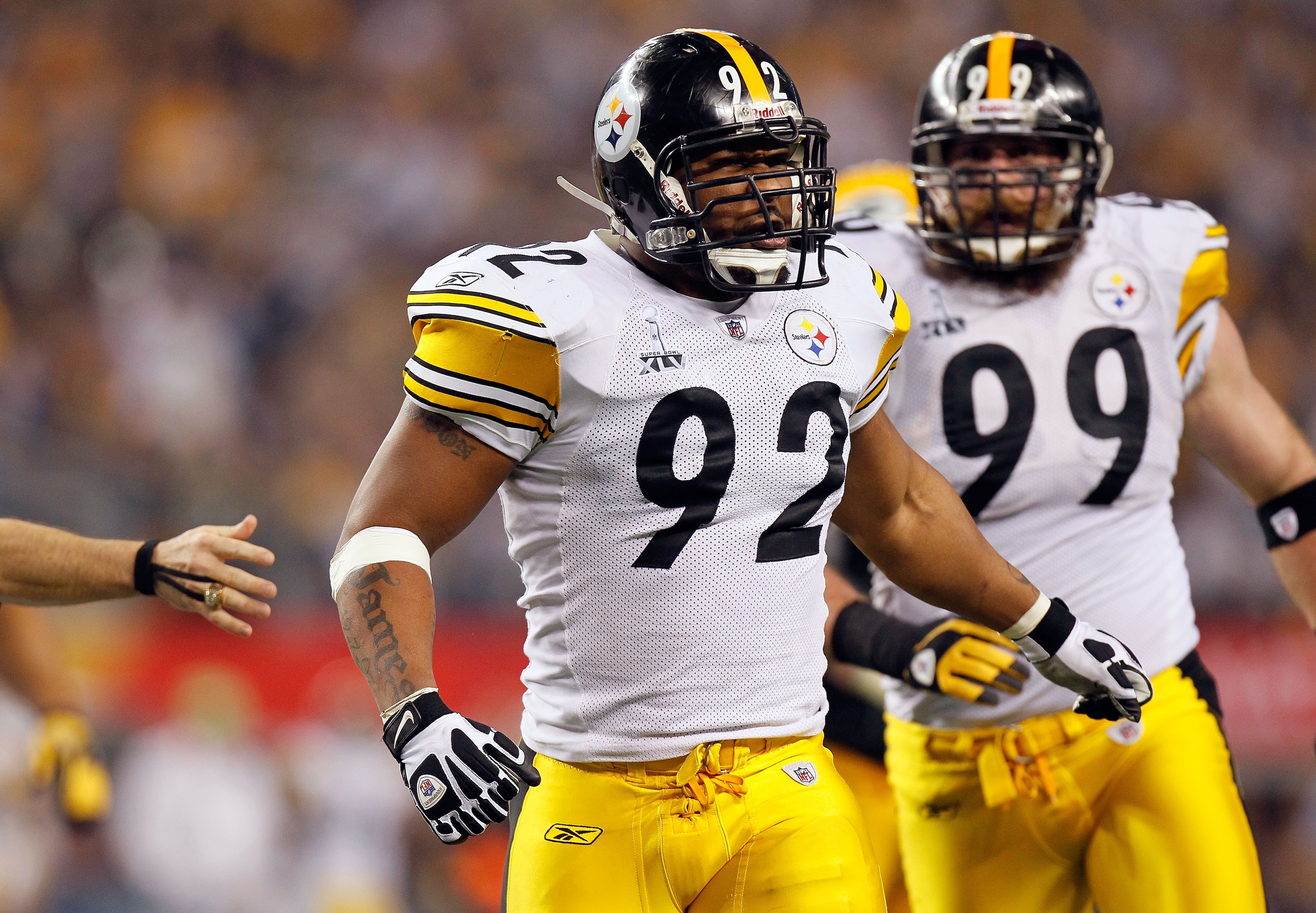 ARLINGTON, TX - FEBRUARY 06:  James Harrison #92 of the Pittsburgh Steelers celebrates a defensive play against the Green Bay Packers during Super Bowl XLV at Cowboys Stadium on February 6, 2011 in Arlington, Texas. The Packers won 31-25.  (Photo by Kevin