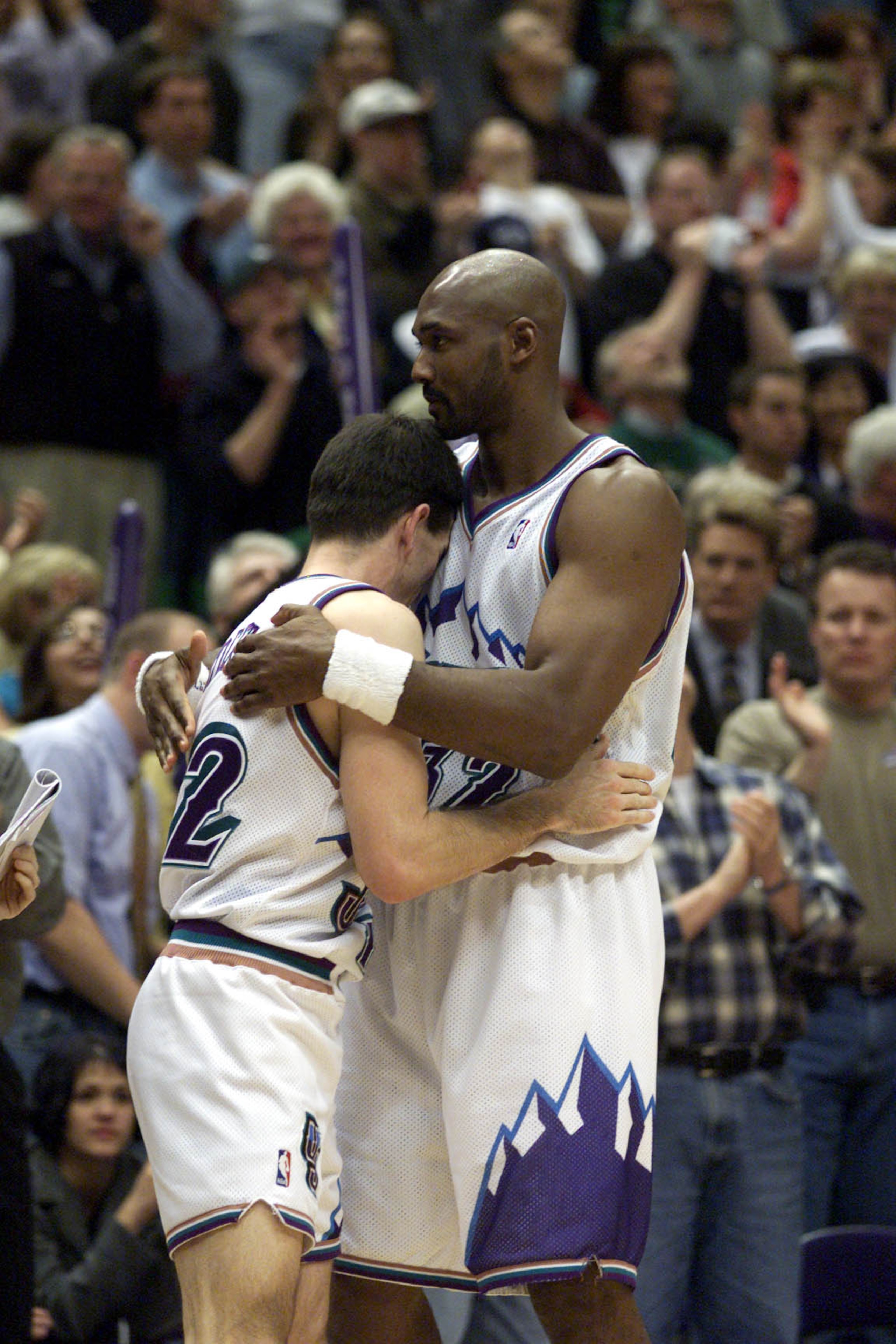 21 Apr 2001:  John Stockton #12 and Karl Malone #32 of the Utah Jazz celebrate after winning game one of the NBA playoffs against the Dallas Mavericks at the Delta Center in Salt Lake City, Utah.  The Jazz won 88-86.  DIGITAL IMAGE.  Mandatory Credit: Bri