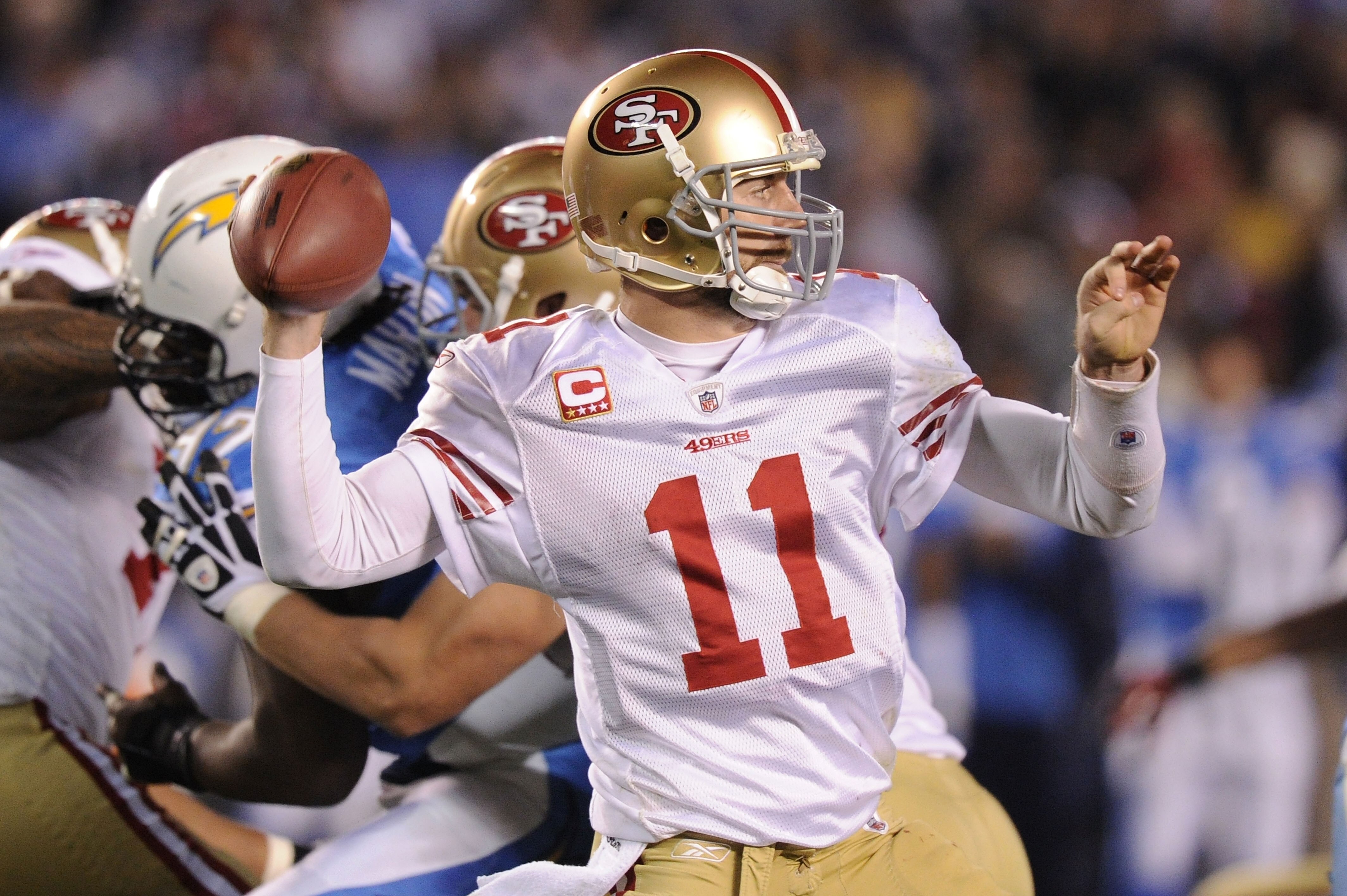 SAN DIEGO, CA - DECEMBER 16:  Quarterback Alex Smith #11 of the San Francisco 49ers drops back to pass against the San Diego Chargers at Qualcomm Stadium on December 16, 2010 in San Diego, California.  (Photo by Harry How/Getty Images)