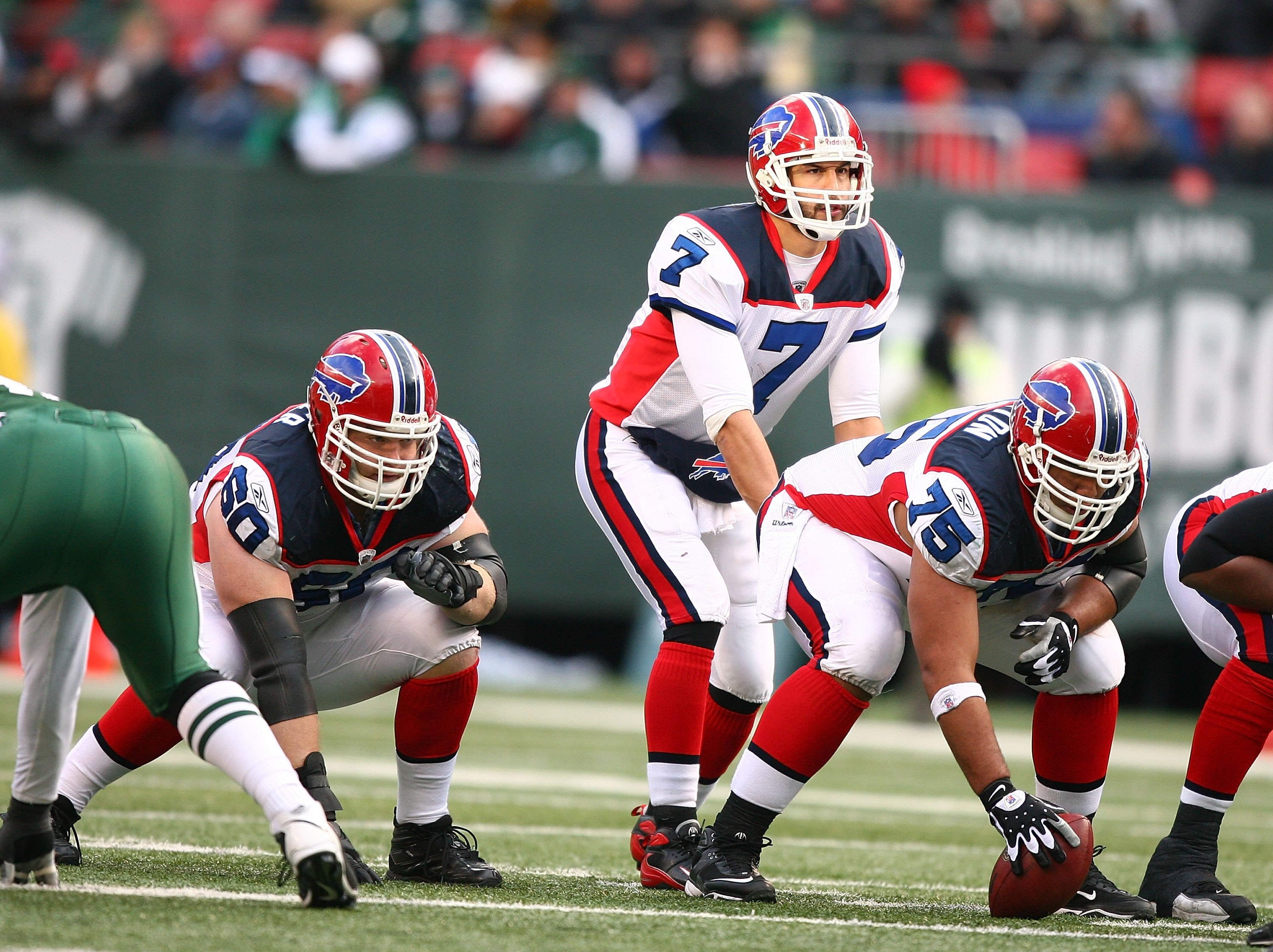 EAST RUTHERFORD, NJ - DECEMBER 14:  Brad Butler #60 and Duke Preston #75  of The Buffalo Bills pass block for JP Losman #7 against the New York Jets during their game on December 14, 2008 at Giants Stadium in East Rutherford, New Jersey.  (Photo by Al Bel