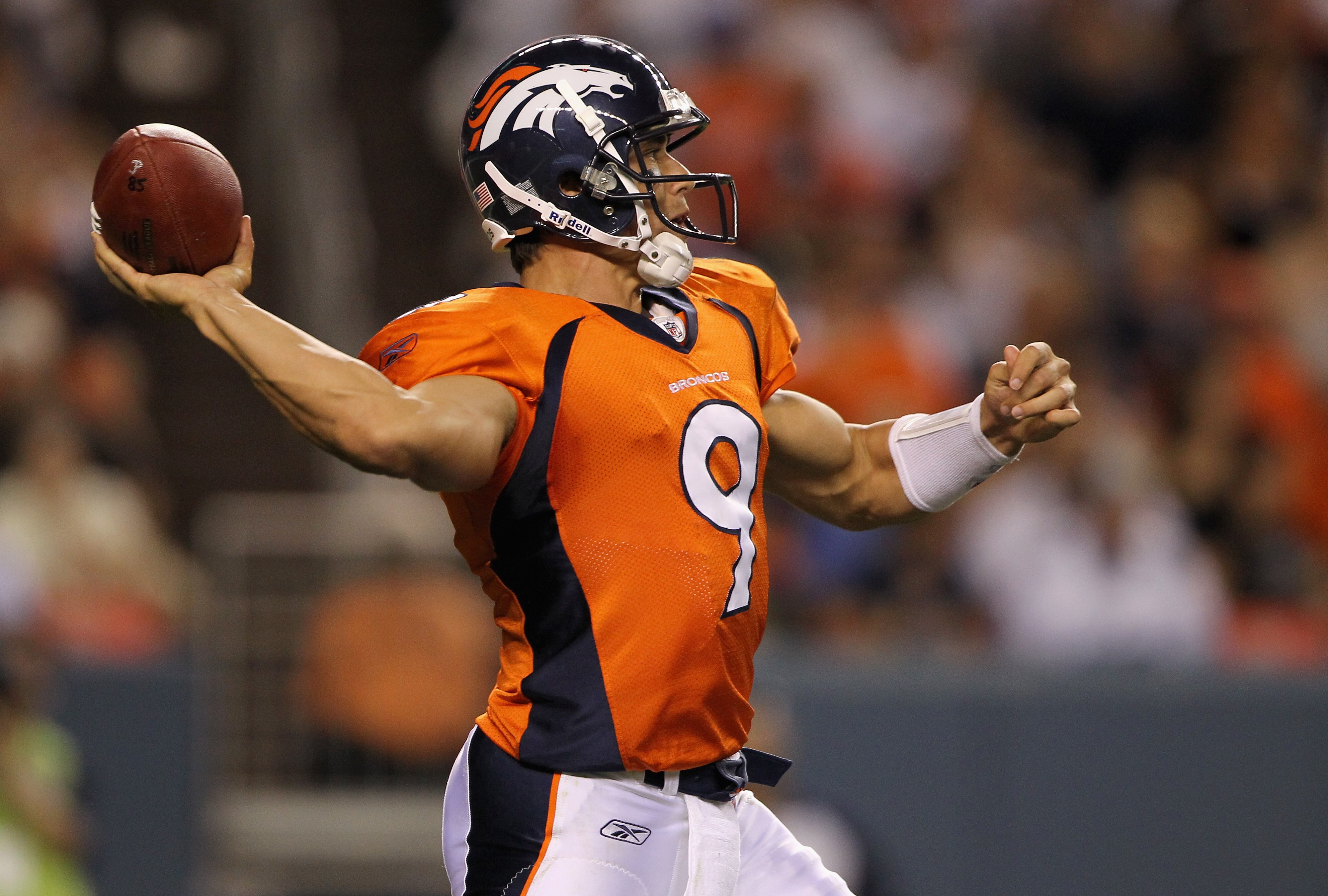 DENVER - AUGUST 21:  Quarterback Brady Quinn #9 of the Denver Broncos delivers a pass against the Detroit Lions during preseason NFL action at INVESCO Field at Mile High on August 21, 2010 in Denver, Colorado. The Lions defeated the Broncos 25-20.  (Photo