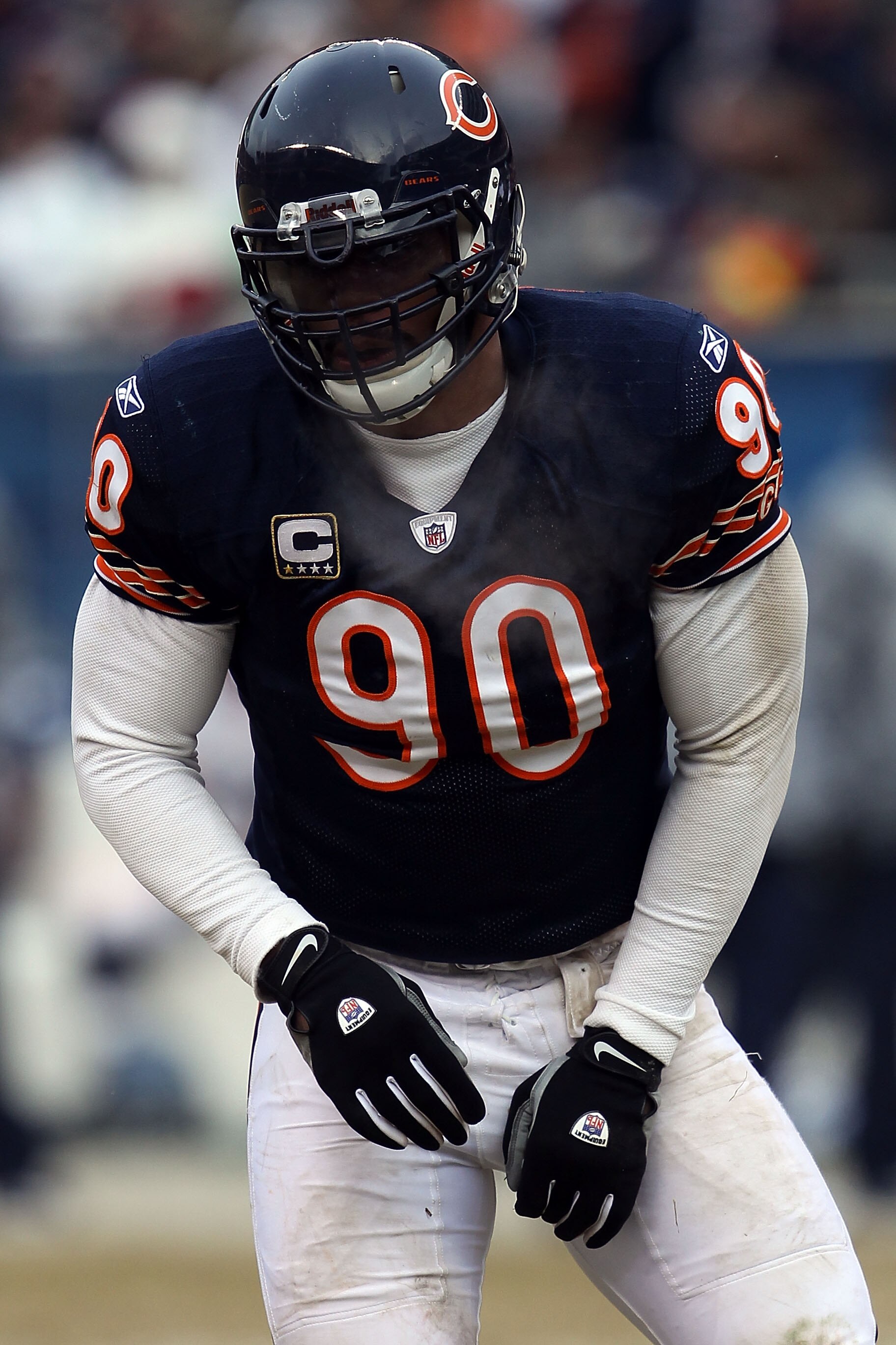 CHICAGO, IL - JANUARY 16:  Julius Peppers #90 of the Chicago Bears looks on against the Seattle Seahawks in the 2011 NFC divisional playoff game at Soldier Field on January 16, 2011 in Chicago, Illinois.  (Photo by Jonathan Daniel/Getty Images)
