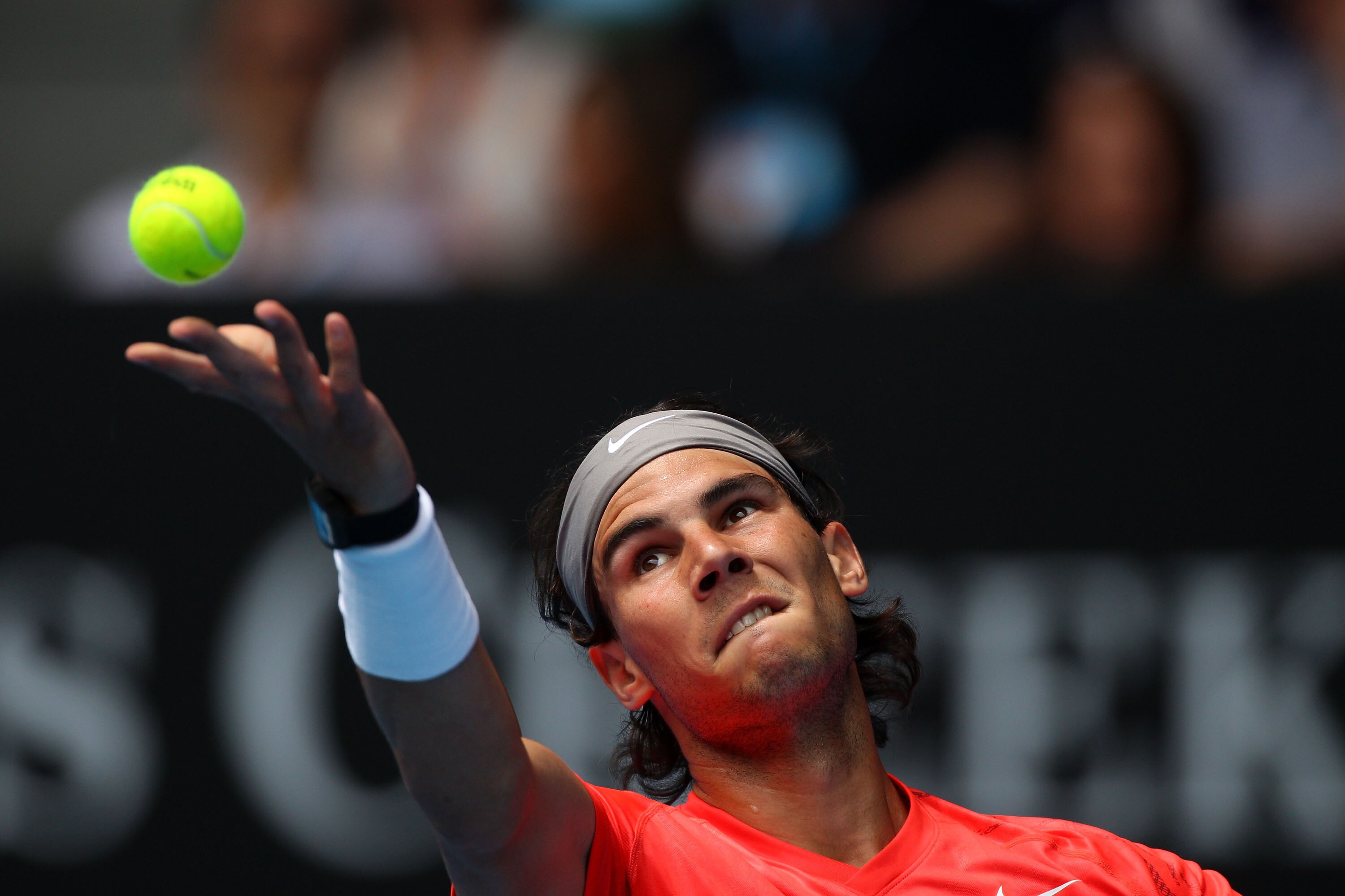 MELBOURNE, AUSTRALIA - JANUARY 18:  Rafael Nadal of Spain serves in his first round match against Marcos Daniel of Brazil during day two of the 2011 Australian Open at Melbourne Park on January 18, 2011 in Melbourne, Australia.  (Photo by Lucas Dawson/Get