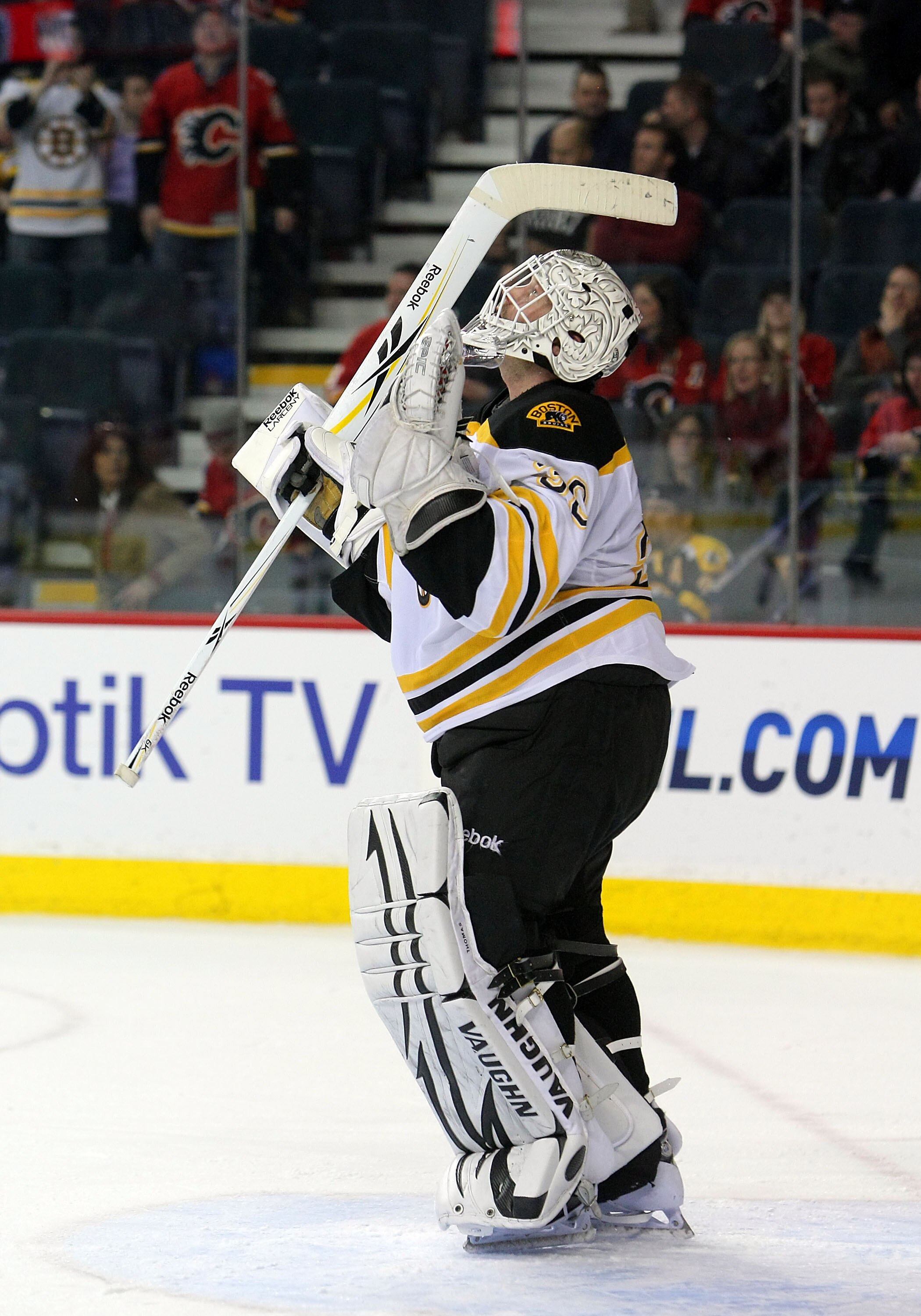 CALGARY,CANADA - FEBRUARY 22:  Tim Thomas #30 of the Boston Bruins celebrates a win against the Calgary Flames looks on during their NHL game at Scotiabank Saddledome, February 22,2011 in Calgary, Alberta, Canada.(Photo By Dave Sandford/Getty Images)