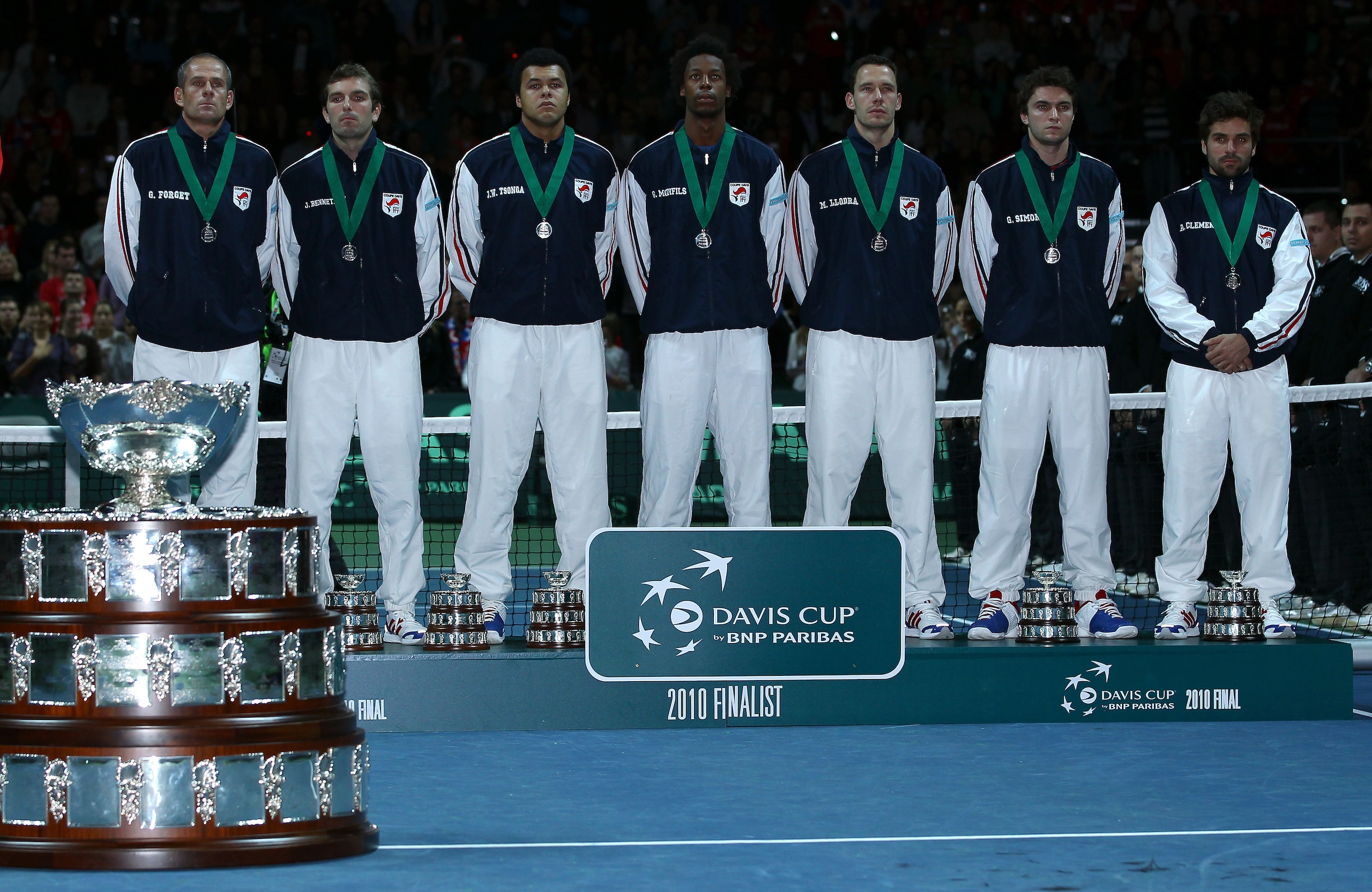 BELGRADE, SERBIA - DECEMBER 05:  The French team with their runners up medals, (L-R)  Guy Forget, Julien Benneteau, Jo-Wilfried Tsonga, Gael Monfils, Michael Llodra, Gilles Simon and Arnaud Clement during day three of the Davis Cup Tennis Final at the Beg