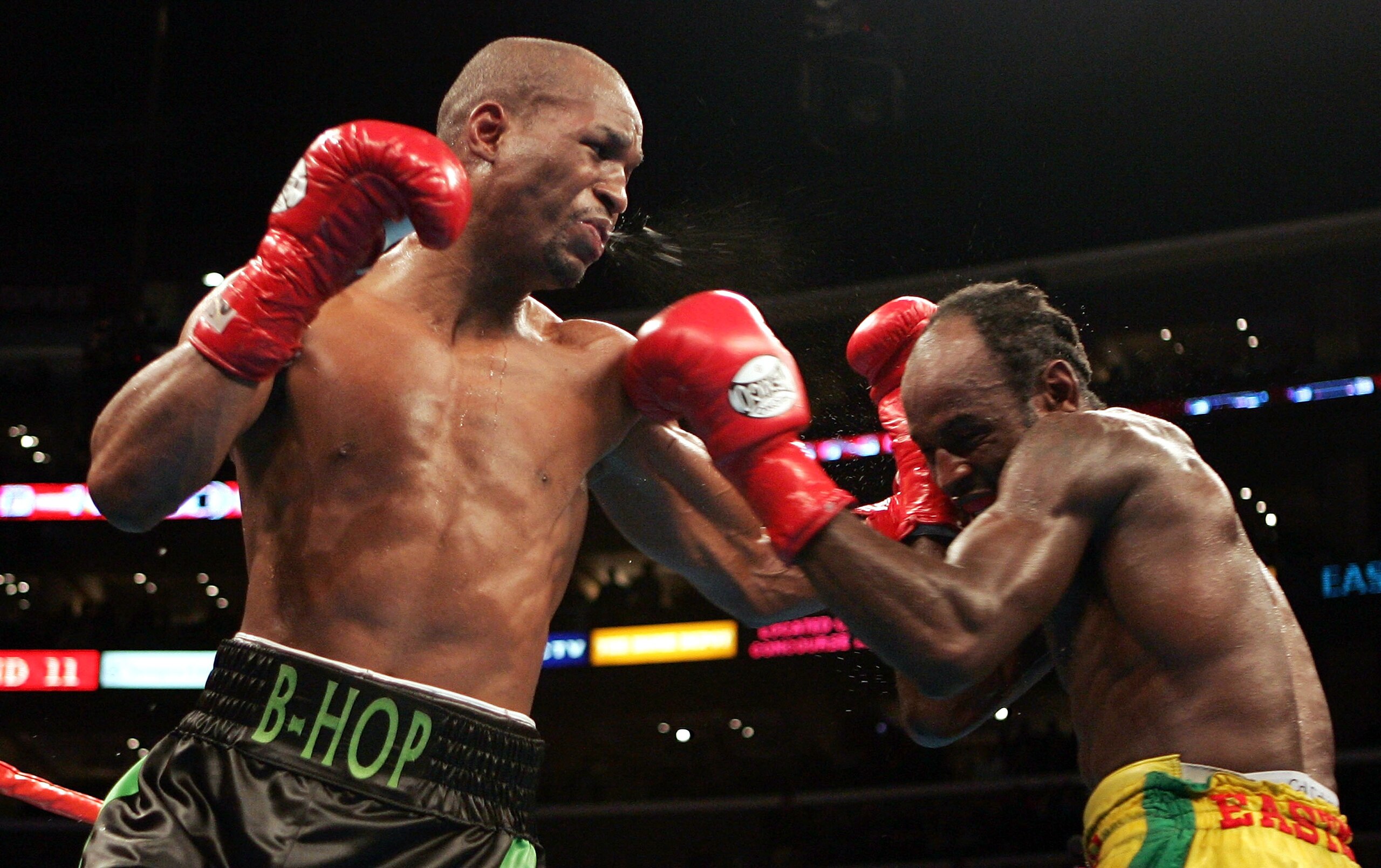 LOS ANGELES, CA - FEBRUARY 19:  Bernard Hopkins (L) lands a left hook on Howard Eastman in the middleweight championship fight at Staples Center on February 19, 2005 in Los Angeles, California.  (Photo by Nick Laham/Getty Images)