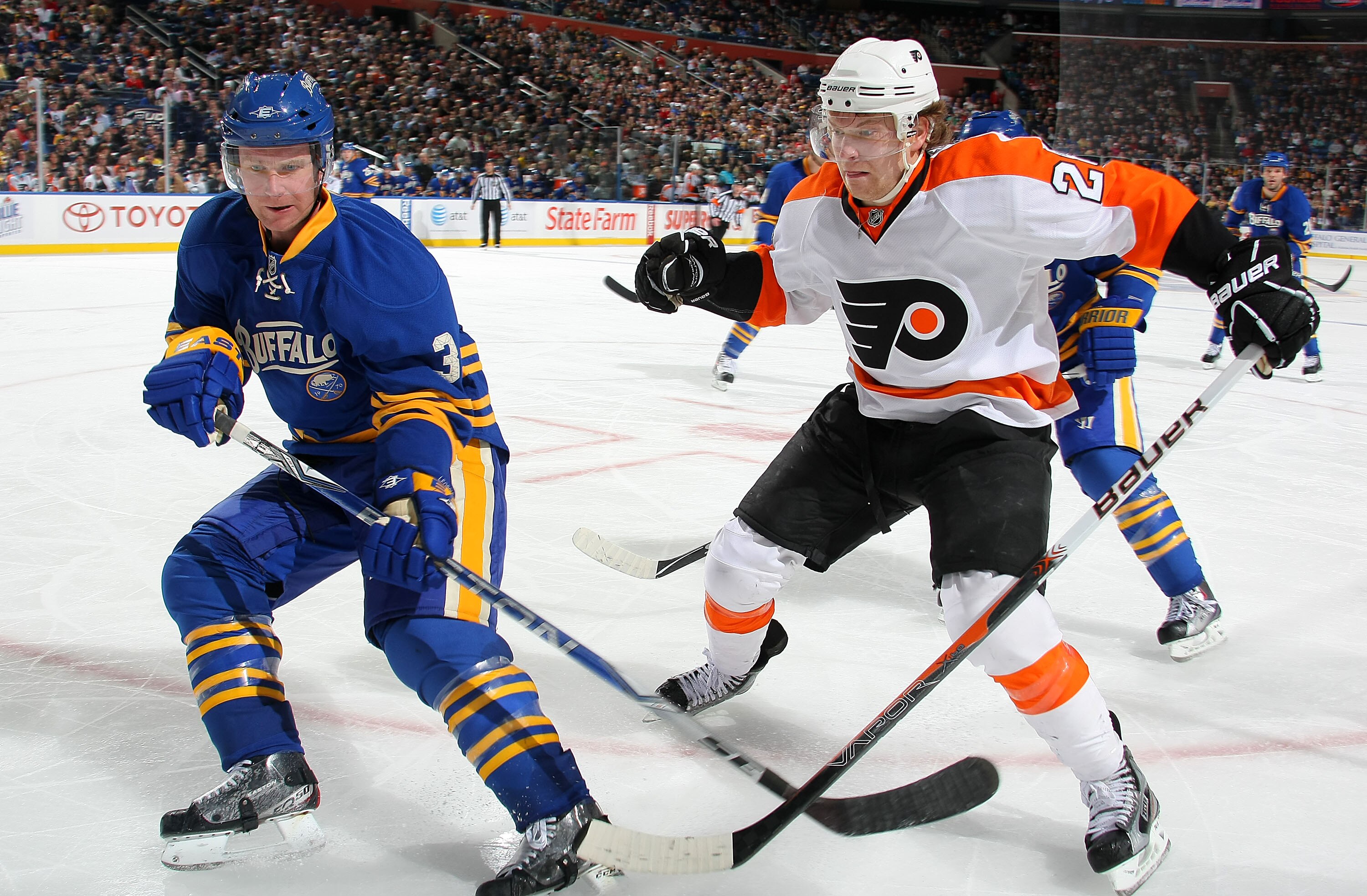 BUFFALO NY - JANUARY 11: Claude Giroux #28 of the Philadelphia Flyers battles for the puck against Jordan Leopold #3 of the Buffalo Sabres during their NHL game at HSBC Arena January 11, 2011 in Buffalo, New York. (Photo By Dave Sandford/Getty Images) BUFFALO NY - JANUARY 11: Claude Giroux #28 of the Philadelphia Flyers battles for the puck against Jordan Leopold #3 of the Buffalo Sabres during their NHL game at HSBC Arena January 11, 2011 in Buffalo, New York. (Photo By Dave Sandford/Getty Images)