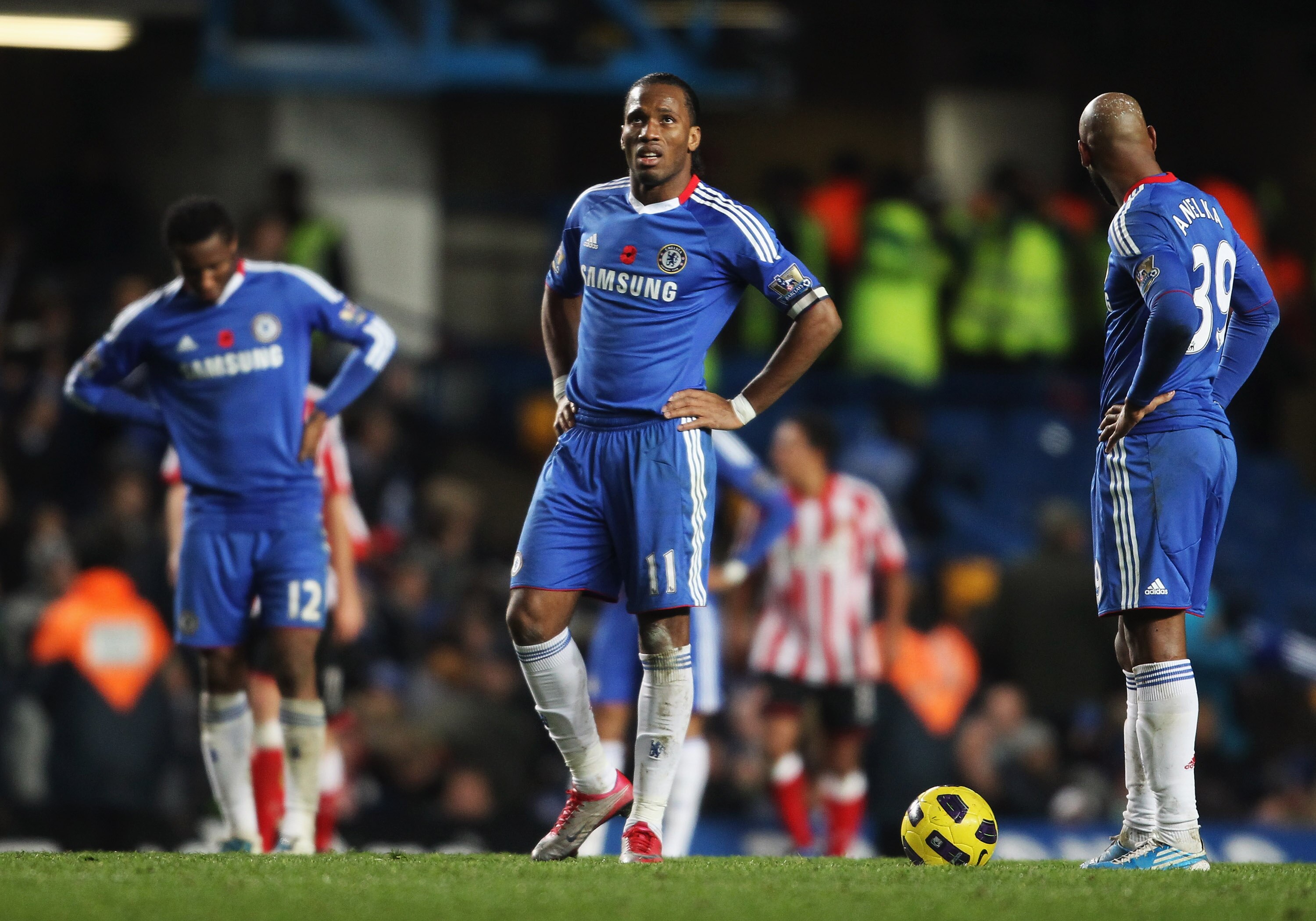 LONDON, ENGLAND - NOVEMBER 14:  (L-R) John Obi Mikel, Didier Drogba and Nicolas Anelka of Chelsea look dejected during the Barclays Premier League match between Chelsea and Sunderland at Stamford Bridge on November 14, 2010 in London, England.  (Photo by