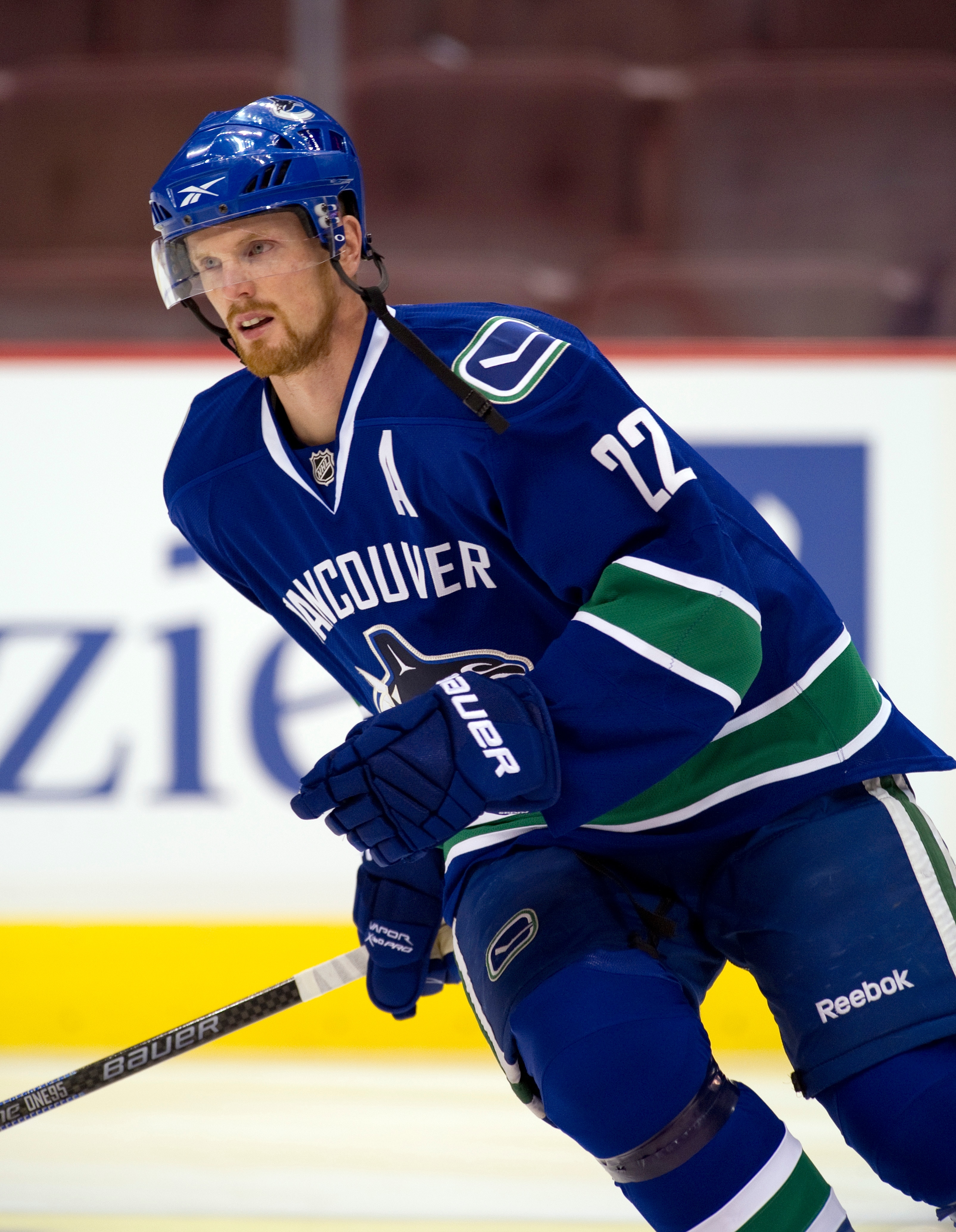 VANCOUVER, CANADA - SEPTEMBER 22: Daniel Sedin #22 of the Vancouver Canucks takes part in the team warm up prior to NHL pre-season action against the Edmonton Oilers on September 22, 2010 at Rogers Arena in Vancouver, British Columbia, Canada.  (Photo by