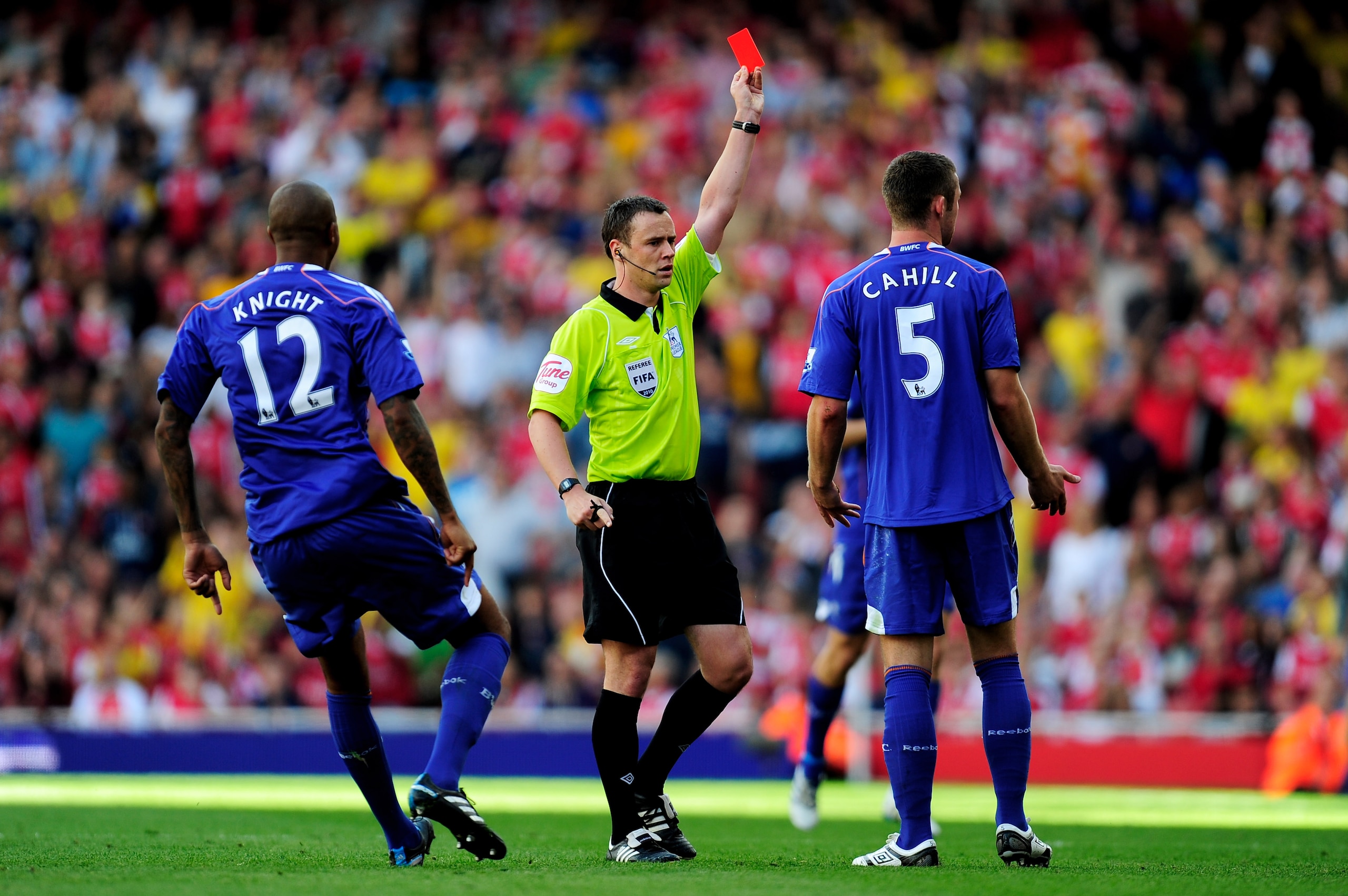 LONDON, ENGLAND - SEPTEMBER 11: Referee Stuart Attwell shows Gary Cahill of Bolton a red card during the Barclays Premier League match between Arsenal and Bolton Wanderers at The Emirates Stadium on September 11, 2010 in London, England. (Photo by Jamie LONDON, ENGLAND - SEPTEMBER 11: Referee Stuart Attwell shows Gary Cahill of Bolton a red card during the Barclays Premier League match between Arsenal and Bolton Wanderers at The Emirates Stadium on September 11, 2010 in London, England. (Photo by Jamie