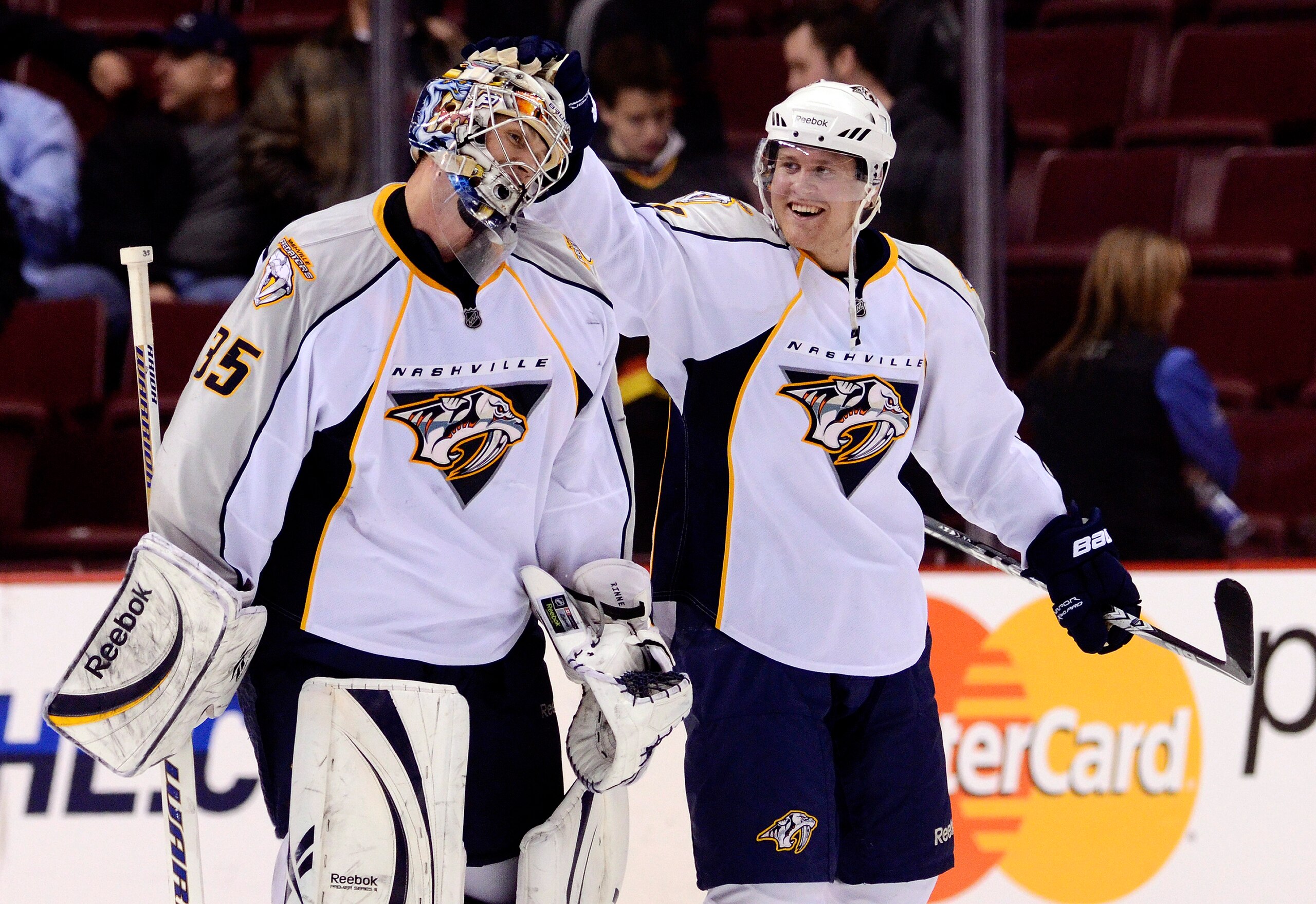 VANCOUVER, CANADA - MARCH 3: Goalie Pekka Rinne #35 of the Nashville Predators is congratulated by Patric Hornqvist #27 after defeating the Vancouver Canucks 3-0 in NHL action on March 03, 2011 at Rogers Arena in Vancouver, British Columbia, Canada.  (Pho