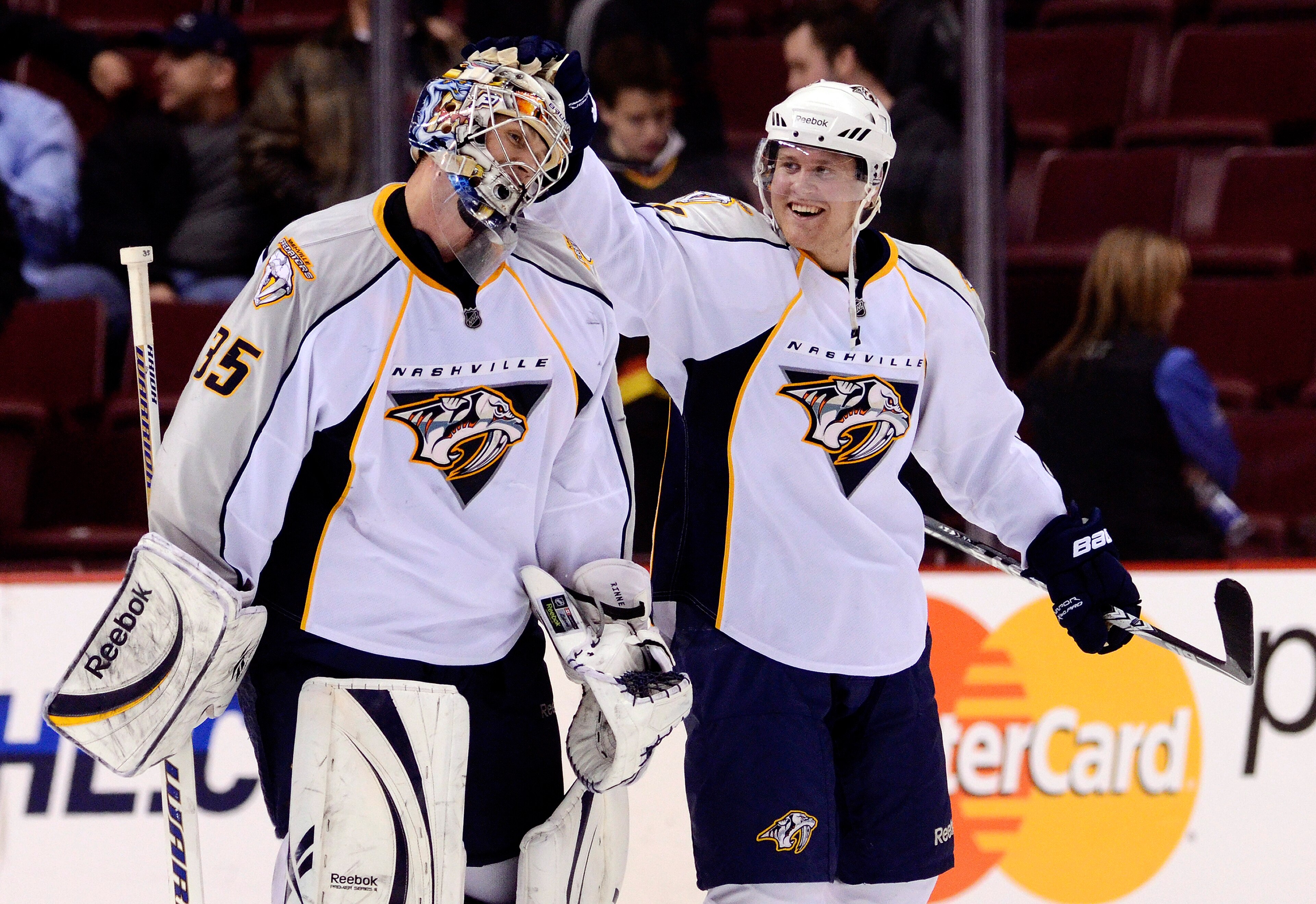 VANCOUVER, CANADA - MARCH 3: Goalie Pekka Rinne #35 of the Nashville Predators is congratulated by Patric Hornqvist #27 after defeating the Vancouver Canucks 3-0 in NHL action on March 03, 2011 at Rogers Arena in Vancouver, British Columbia, Canada. (Pho VANCOUVER, CANADA - MARCH 3: Goalie Pekka Rinne #35 of the Nashville Predators is congratulated by Patric Hornqvist #27 after defeating the Vancouver Canucks 3-0 in NHL action on March 03, 2011 at Rogers Arena in Vancouver, British Columbia, Canada. (Pho