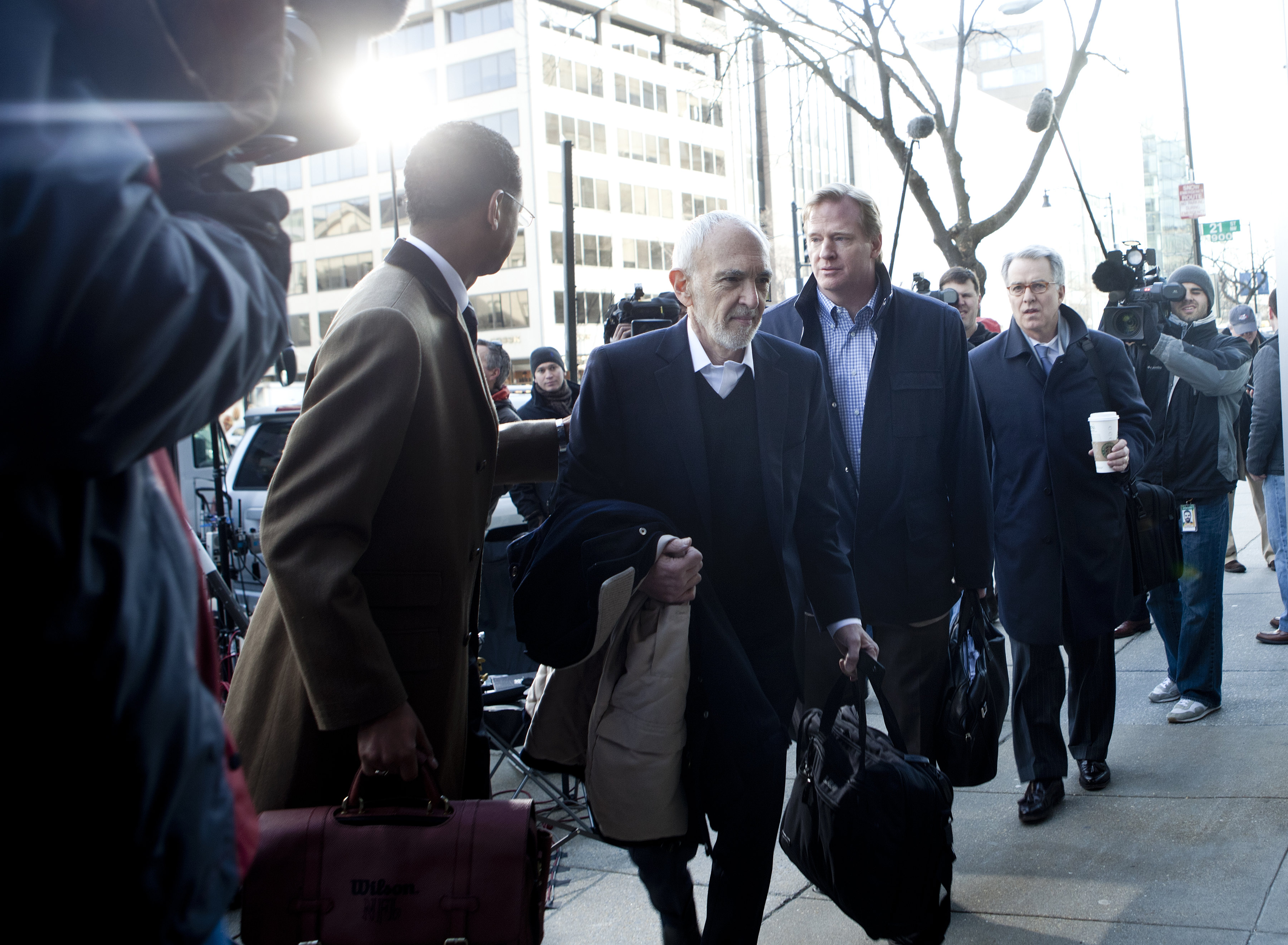 WASHINGTON - MARCH 4: NFL Commissioner Roger Goodell (2R) and others arrives for an extra day of negotiations at the Federal Mediation and Conciliation Service building March 4, 2011 in Washington, DC.  Representatives from the National Football League (N