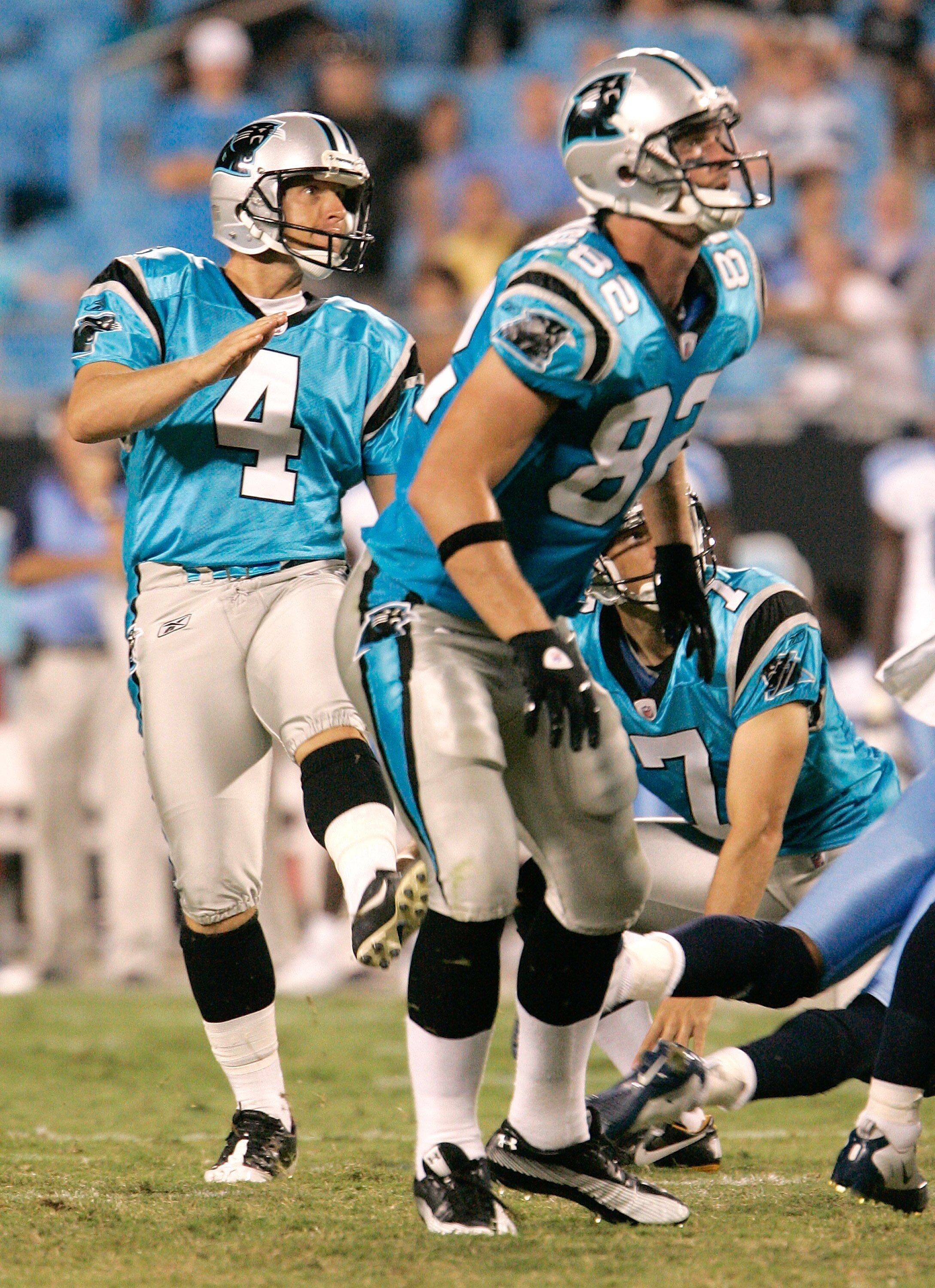 CHARLOTTE, NC - AUGUST 28: Kicker John Kasey #4 of the Carolina Panthers watches his field goal during their preseason game against the Tennessee Titans at Bank of America Stadium on August 28, 2010 in Charlotte, North Carolina. (Photo by Mary Ann Chastai