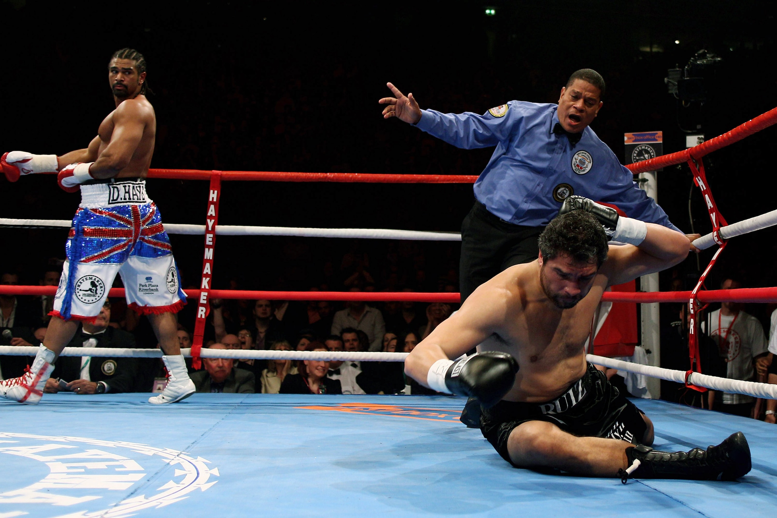 MANCHESTER, ENGLAND - APRIL 03: David Haye (l) of England walks towards a neutral corner after flooring John Ruiz (r) of USA during the World Heavyweight Bout at the MEN Arena on April 3, 2010 in Manchester, England. (Photo by Michael Steele/Getty Image MANCHESTER, ENGLAND - APRIL 03: David Haye (l) of England walks towards a neutral corner after flooring John Ruiz (r) of USA during the World Heavyweight Bout at the MEN Arena on April 3, 2010 in Manchester, England. (Photo by Michael Steele/Getty Image