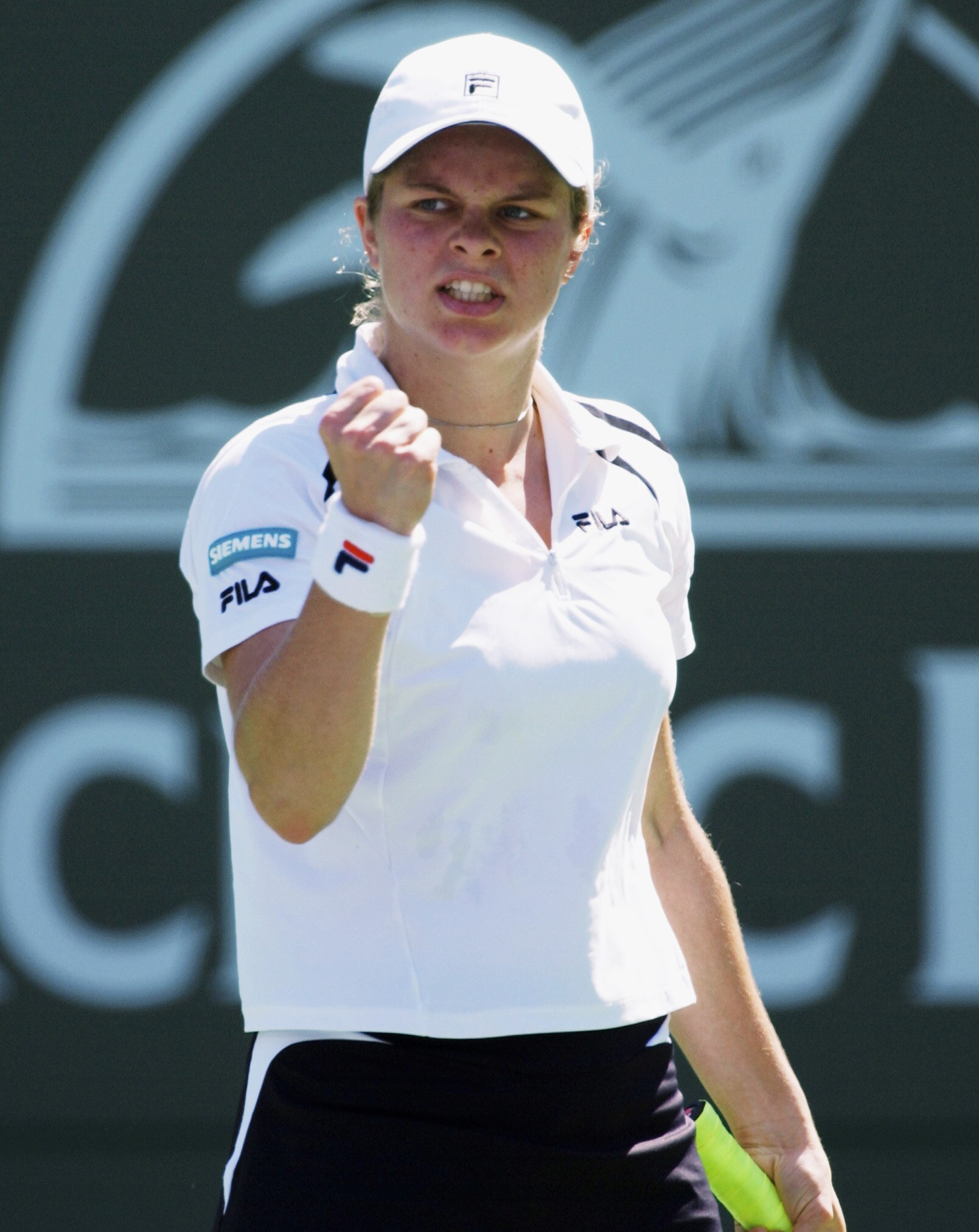 INDIAN WELLS, CA - MARCH 14:  Kim Clijsters of Belgium celebrates a point against Conchita Martinez of Spain during the Pacific Life Open March 14, 2003 at the Indian Wells Tennis Garden in Indian Wells, California. (Photo by Matthew Stockman/Getty Images