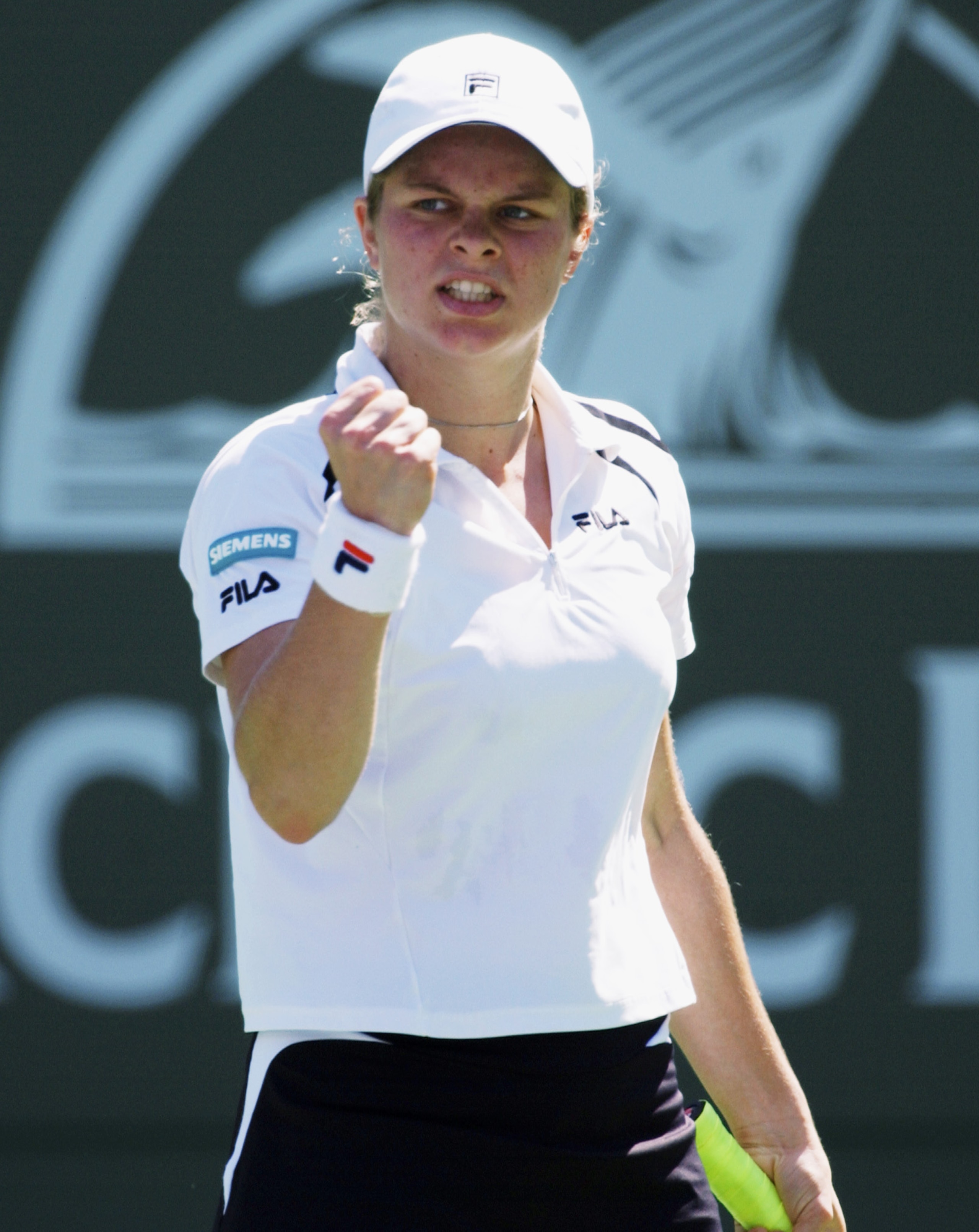 INDIAN WELLS, CA - MARCH 14: Kim Clijsters of Belgium celebrates a point against Conchita Martinez of Spain during the Pacific Life Open March 14, 2003 at the Indian Wells Tennis Garden in Indian Wells, California. (Photo by Matthew Stockman/Getty Images INDIAN WELLS, CA - MARCH 14: Kim Clijsters of Belgium celebrates a point against Conchita Martinez of Spain during the Pacific Life Open March 14, 2003 at the Indian Wells Tennis Garden in Indian Wells, California. (Photo by Matthew Stockman/Getty Images