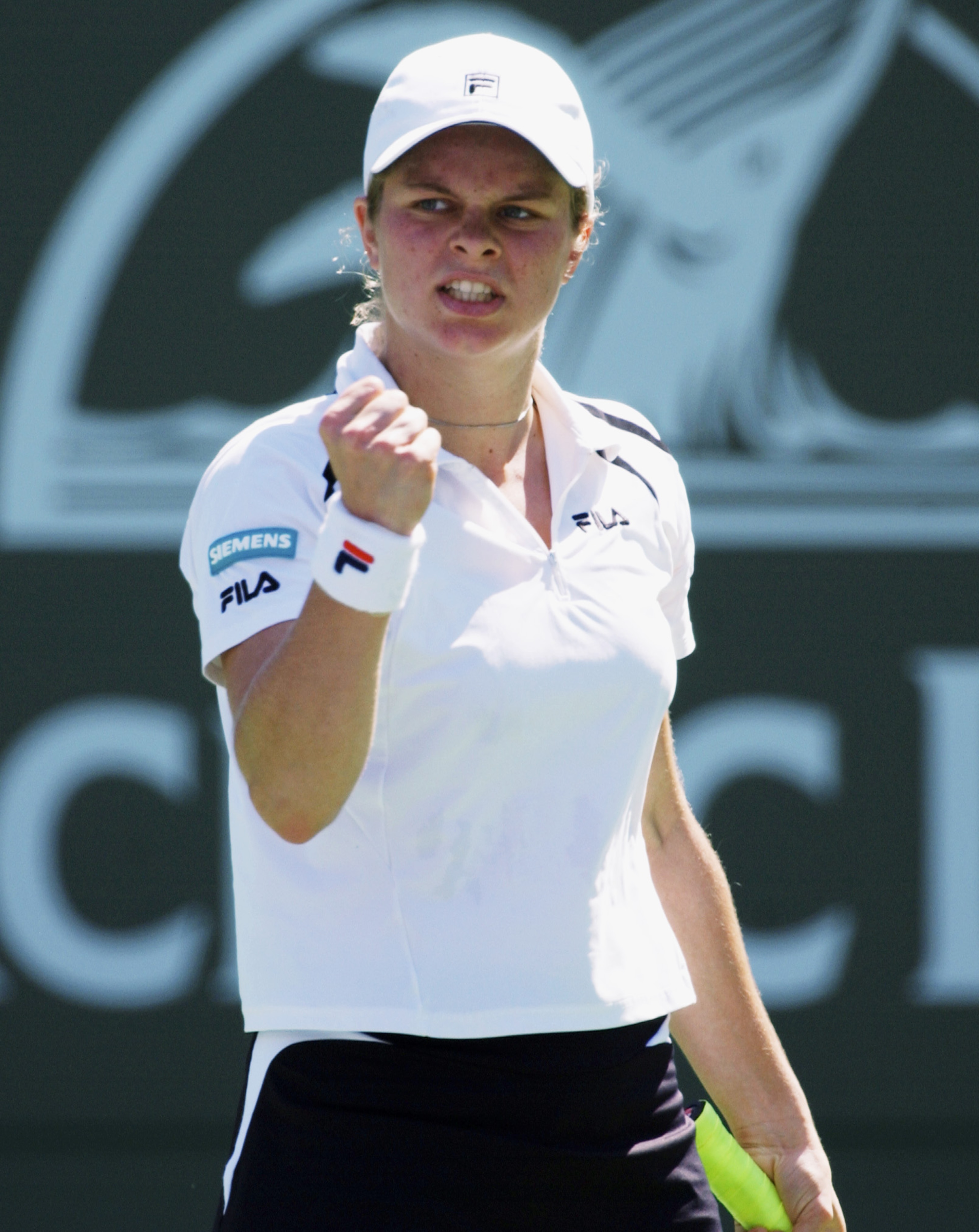 INDIAN WELLS, CA - MARCH 14:  Kim Clijsters of Belgium celebrates a point against Conchita Martinez of Spain during the Pacific Life Open March 14, 2003 at the Indian Wells Tennis Garden in Indian Wells, California. (Photo by Matthew Stockman/Getty Images