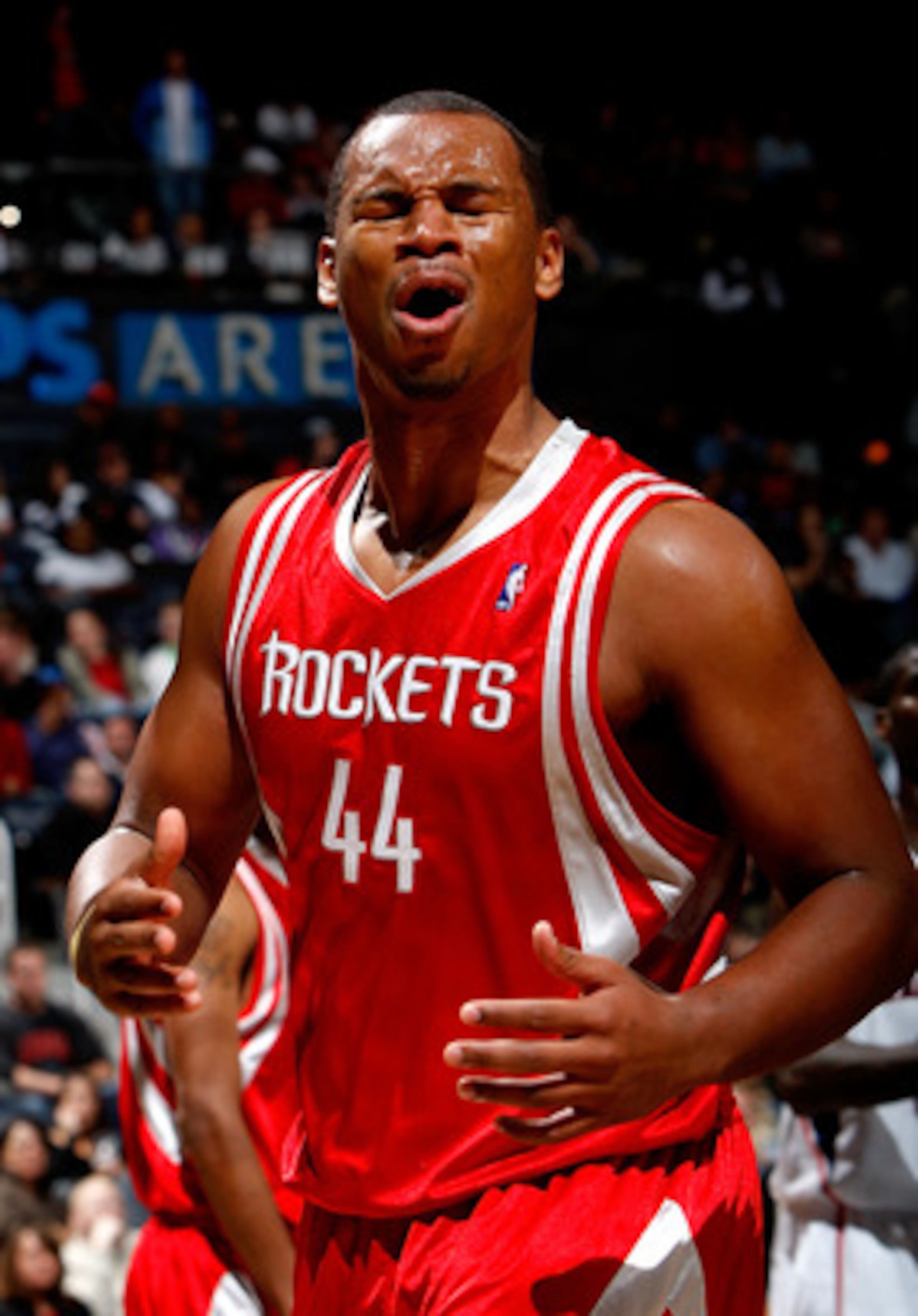 ATLANTA - NOVEMBER 20:  Chuck Hayes #44 of the Houston Rockets reacts to being called for a foul during the game against the Atlanta Hawks at Philips Arena on November 20, 2009 in Atlanta, Georgia.  NOTE TO USER: User expressly acknowledges and agrees tha