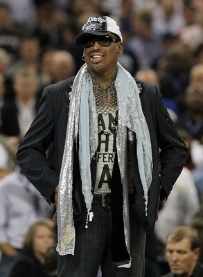 HOUSTON, TX - APRIL 04:  Naismith Memorial Basketball Hall of Fame 2011 inductee Dennis Rodman looks on during halftime of the National Championship Game of the 2011 NCAA Division I Men's Basketball Tournament at Reliant Stadium on April 4, 2011 in Housto