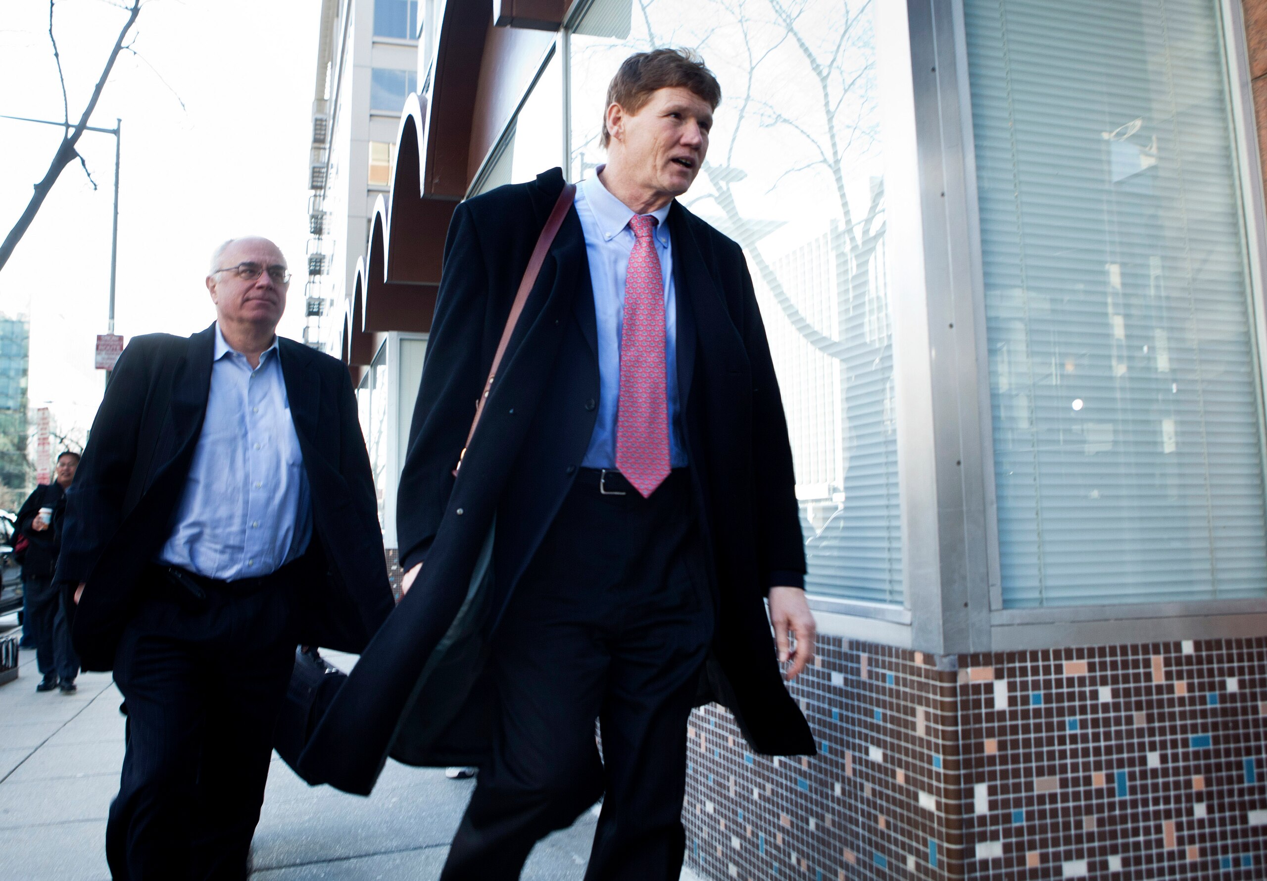 WASHINGTON - MARCH 4: Mark Murphy (R), resident & Chief Executive Officer of the Green Bay Packers, arrives for an extra day of negotiations at the Federal Mediation and Conciliation Service building March 4, 2011 in Washington, DC.  Representatives from