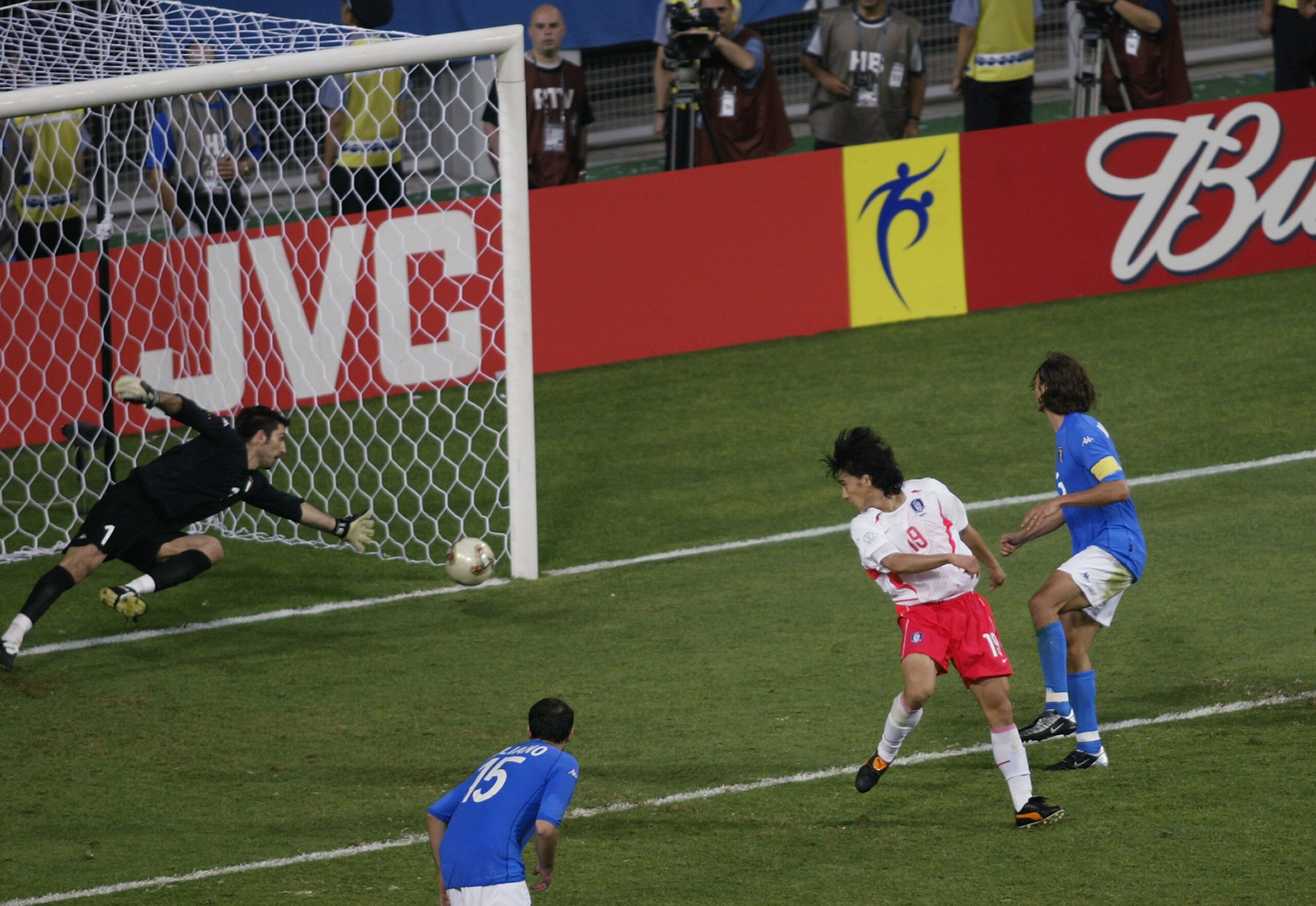 DAEJEON - JUNE 18:  Jung Hwan Ahn of South Korea heads the winning goal past goalkeeper Gianluigi Buffon of Italy during the FIFA World Cup Finals 2002 Second Round match played at the Daejeon World Cup Stadium, in Daejeon, South Korea on June 18, 2002. S