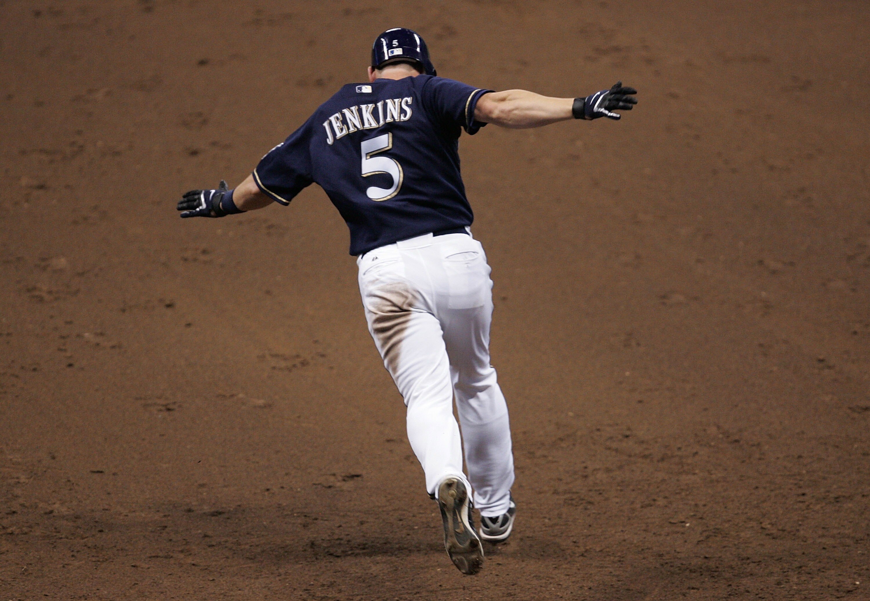 MILWAUKEE - JULY 31: Geoff Jenkins #5 of the Milwaukee Brewers runs the bases after hitting a two-run, walk-off home run in the bottom of the 13th inning that beat the New York Mets on July 31, 2007 at Miller Park in Milwaukee, Wisconsin. The Brewers defe