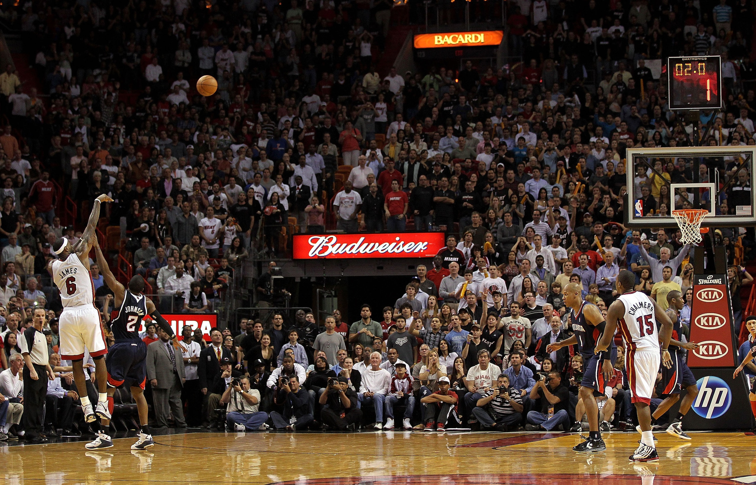 MIAMI, FL - JANUARY 18: LeBron James #6 of the Miami Heat shoots over Joe Johnson #2 of the Atlanta Hawks during a game at American Airlines Arena on January 18, 2011 in Miami, Florida. NOTE TO USER: User expressly acknowledges and agrees that, by downlo MIAMI, FL - JANUARY 18: LeBron James #6 of the Miami Heat shoots over Joe Johnson #2 of the Atlanta Hawks during a game at American Airlines Arena on January 18, 2011 in Miami, Florida. NOTE TO USER: User expressly acknowledges and agrees that, by downlo