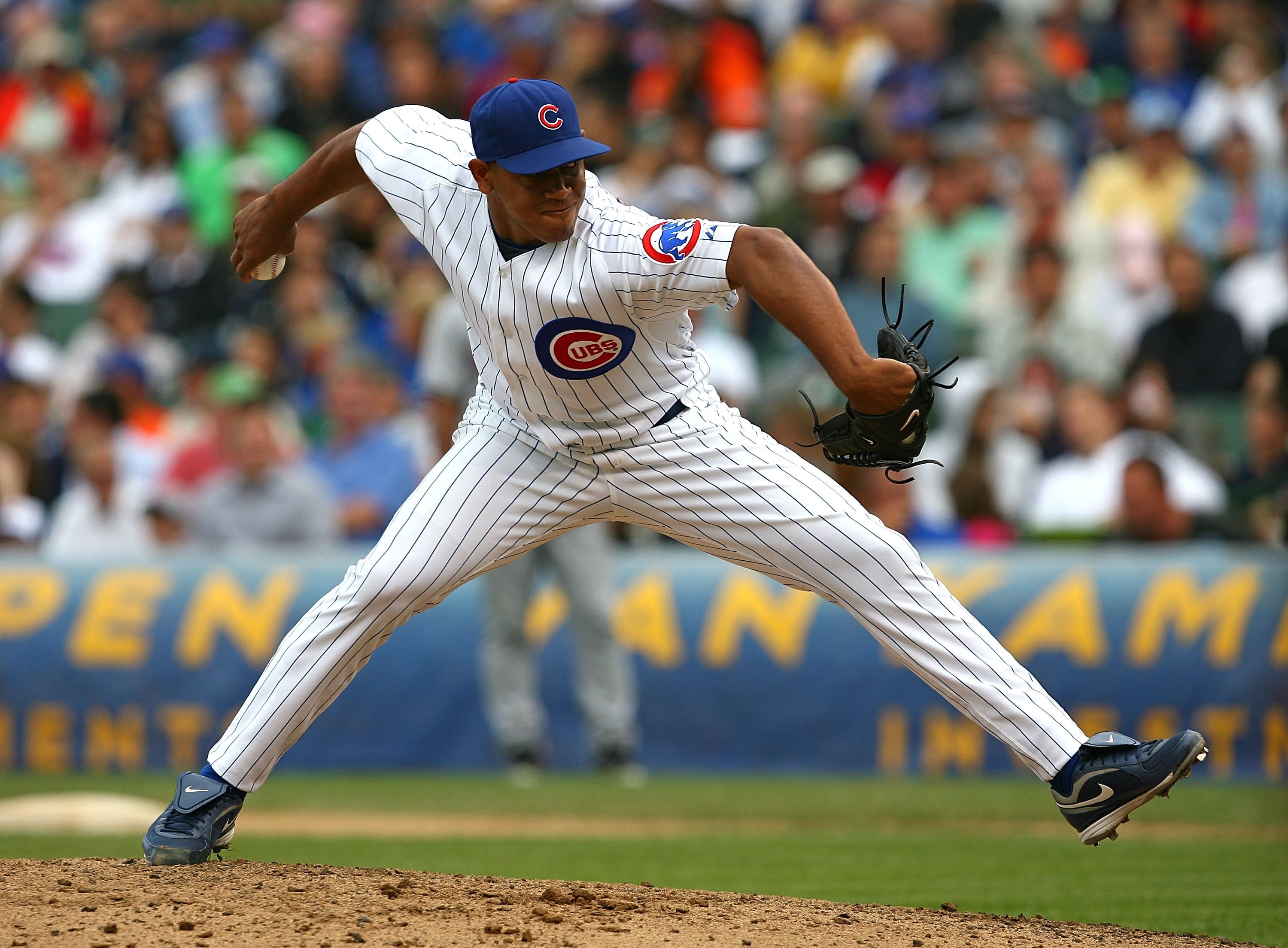 CHICAGO - AUGUST 28: Carlos Marmol #49 of the Chicago Cubs pitches in the 9th inning against the New York Mets on August 28, 2009 at Wrigley Field in Chicago, Illinois. The Cubs defeated the Mets 5-2. (Photo by Jonathan Daniel/Getty Images)
