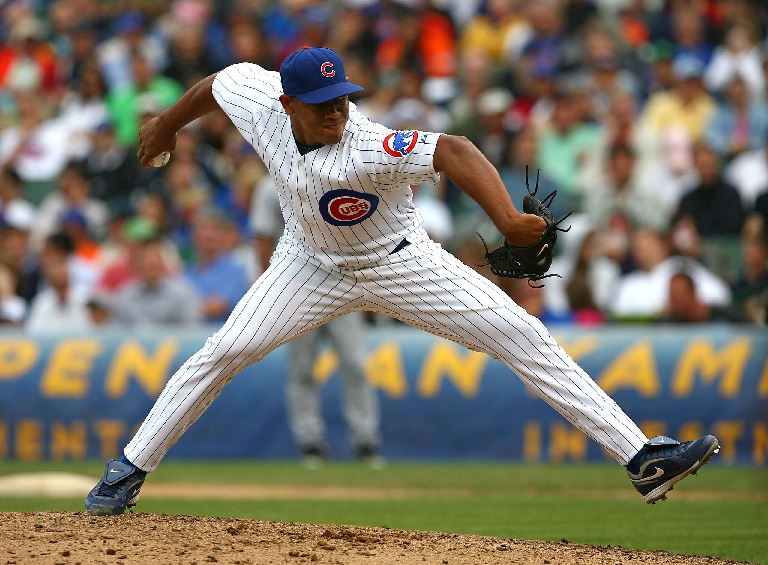 CHICAGO - AUGUST 28: Carlos Marmol #49 of the Chicago Cubs pitches in the 9th inning against the New York Mets on August 28, 2009 at Wrigley Field in Chicago, Illinois. The Cubs defeated the Mets 5-2. (Photo by Jonathan Daniel/Getty Images)