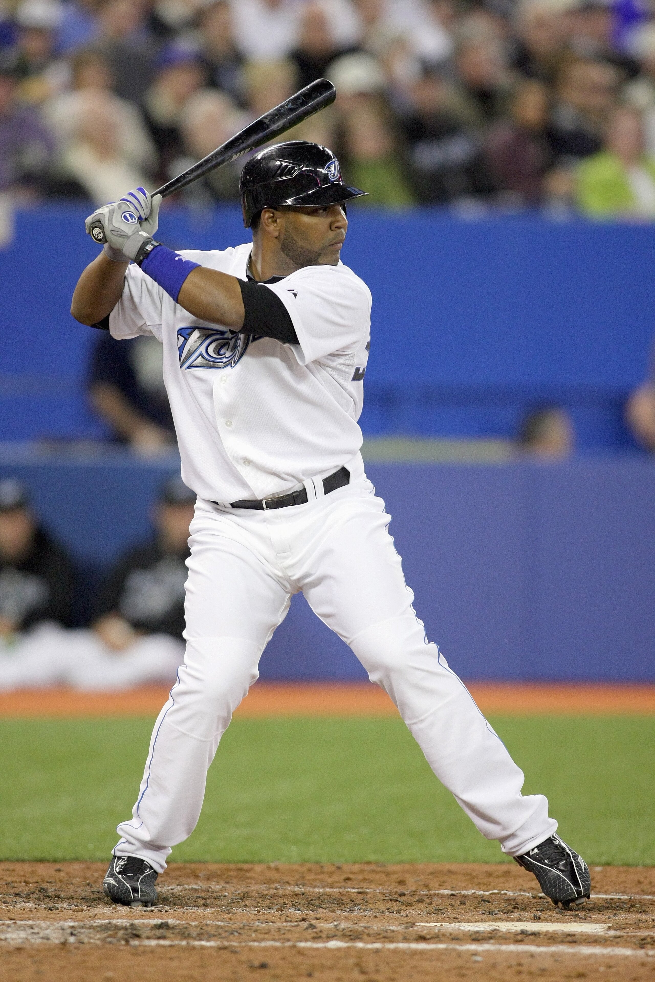 TORONTO - APRIL 12:  Edwin Encarnacion #12 of the Toronto Blue Jays stands at bat during the game against the Chicago White Sox at the Rogers Centre on April 12, 2010 in Toronto, Ontario. (Photo By Dave Sandford/Getty Images)