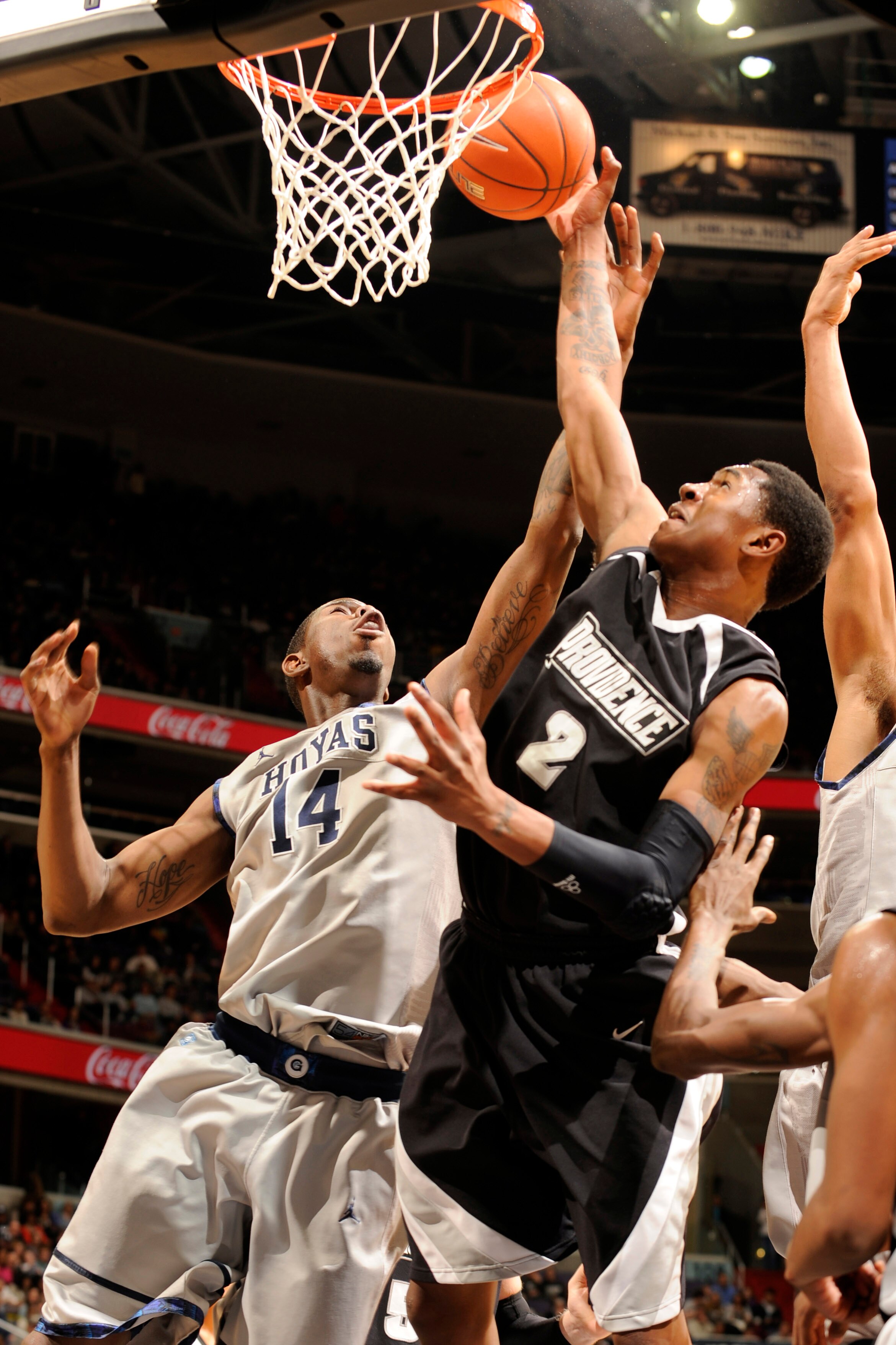 WASHINGTON, DC - FEBRUARY 5:  Marshon Brooks #2 of the Providence Friars takes a shot over Henry Sims #14 of the Georgtown Hoyas during a college basketball game on February 5, 2011 at the Verizon Center in Washington, DC.  The Hoyas won 83-81.  (Photo by