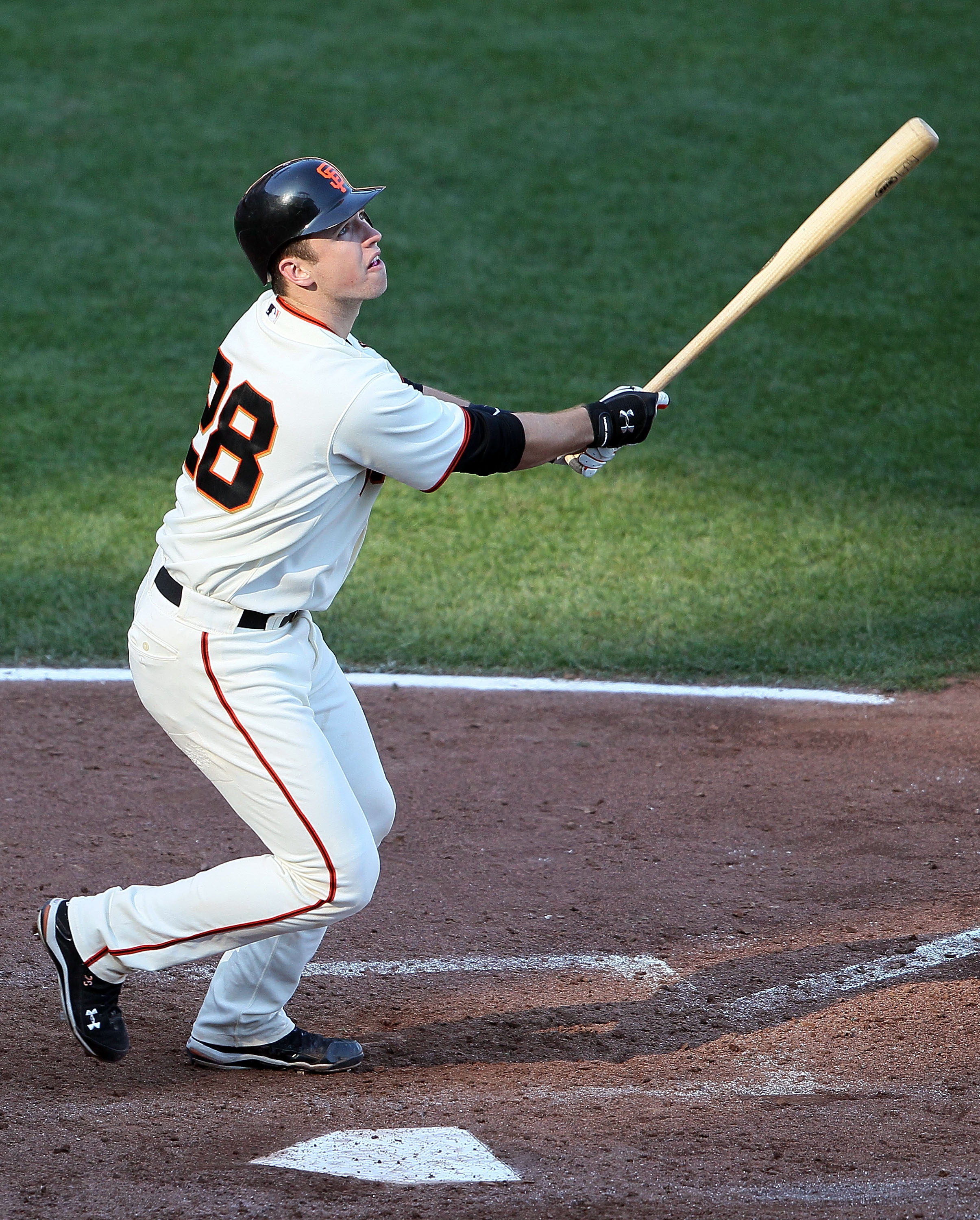 SAN FRANCISCO - OCTOBER 19:  Buster Posey #28 of the San Francisco Giants at bat against the Philadelphia Phillies in Game Three of the NLCS during the 2010 MLB Playoffs at AT&T Park on October 19, 2010 in San Francisco, California.  (Photo by Justin Sull