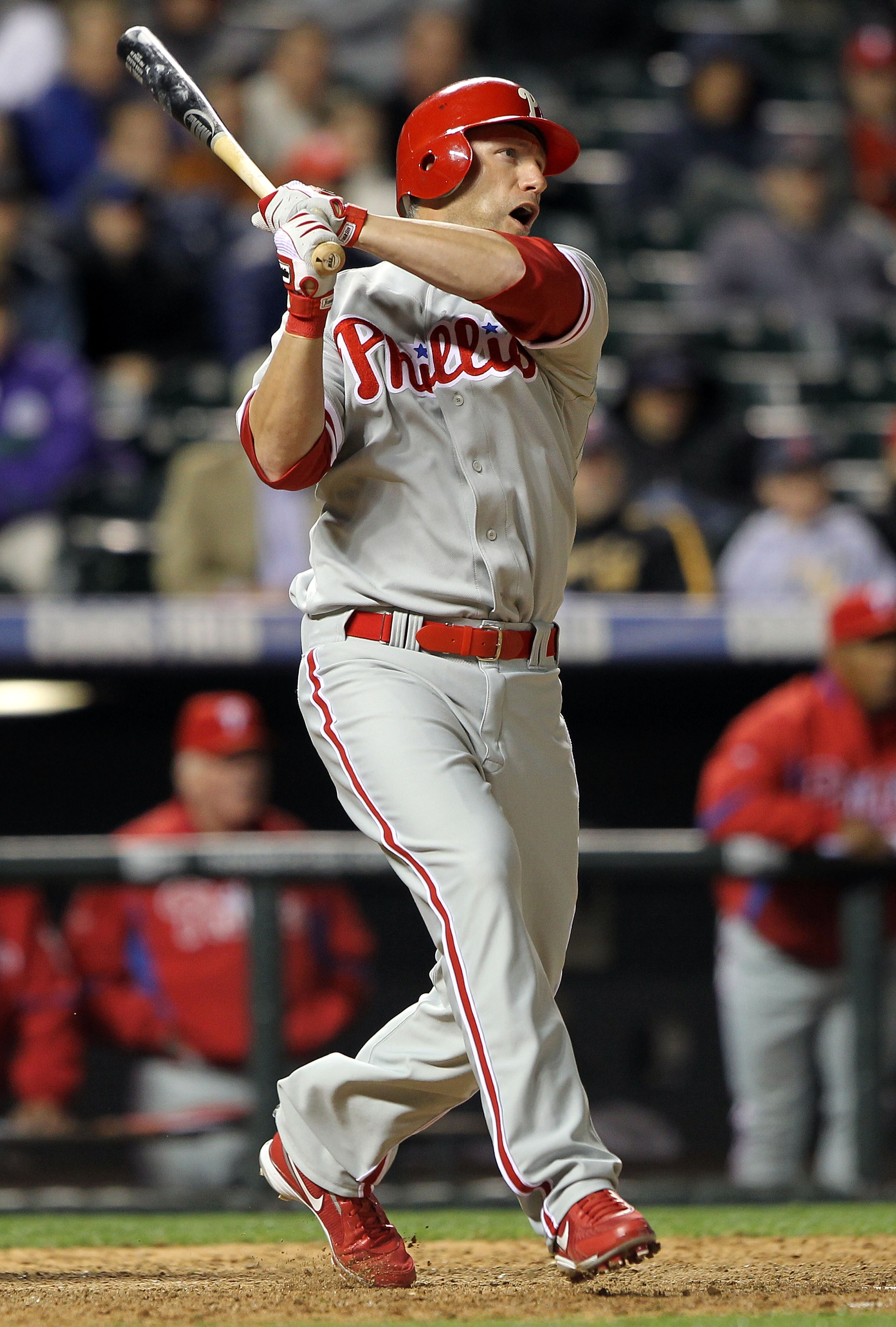 DENVER - MAY 10:  Ross Gload #3 of the Philadelphia Phillies follows through on a three-run pinch hit homerun off of Manuel Corpas #60 of the Colorado Rockies in the ninth inning at Coors Field on May 10, 2010 in Denver, Colorado. The Phillies defeated th