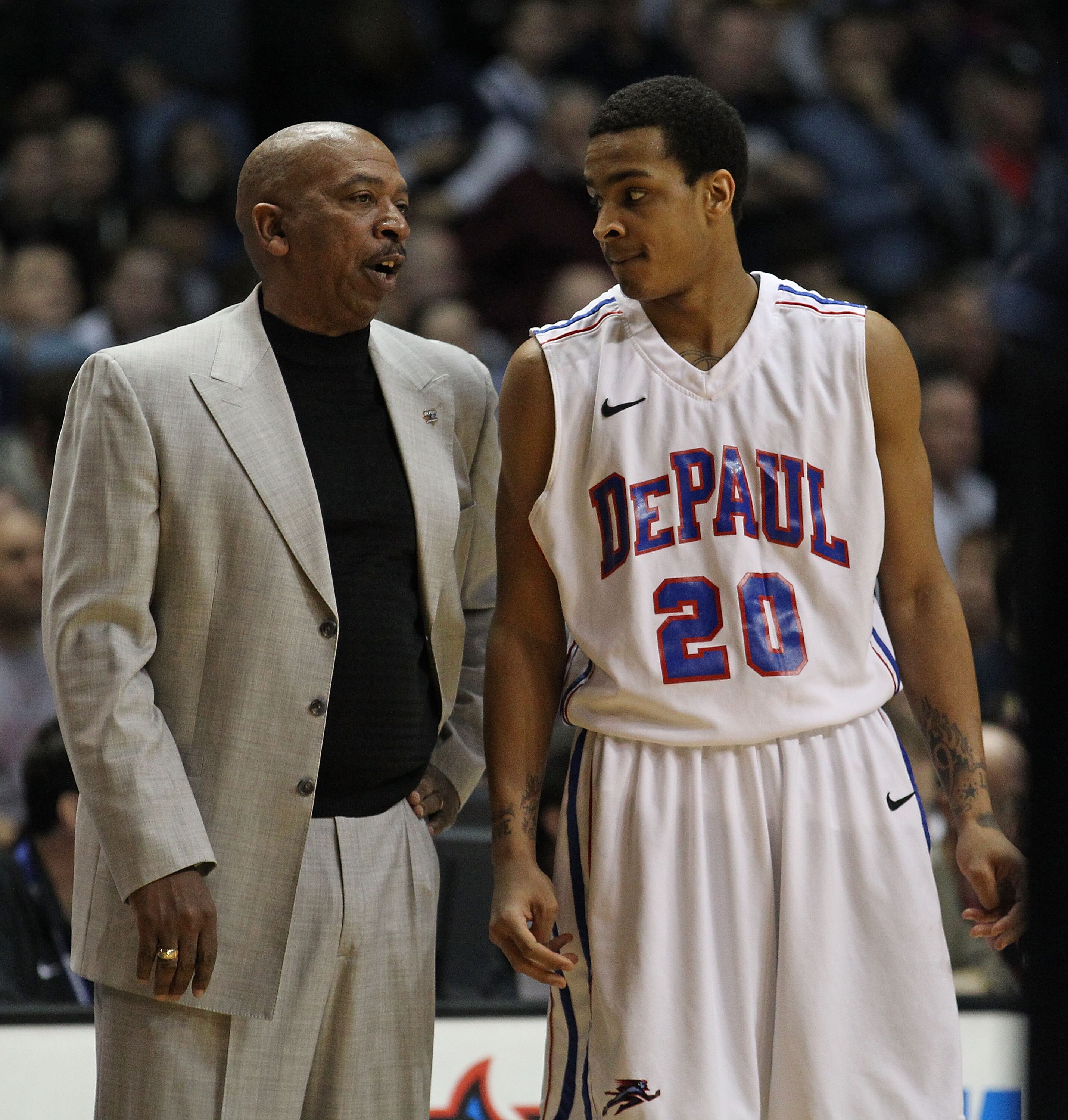 ROSEMONT, IL - FEBRUARY 19: Head coach Oliver Purnell of the DePaul Blue Demons talks with Brandon Young #20 during a game against the Villanova Wildcats at the Allstate Arena on February 19, 2011 in Rosemont, Illinois. Villanova defeated DePaul 77-75 in