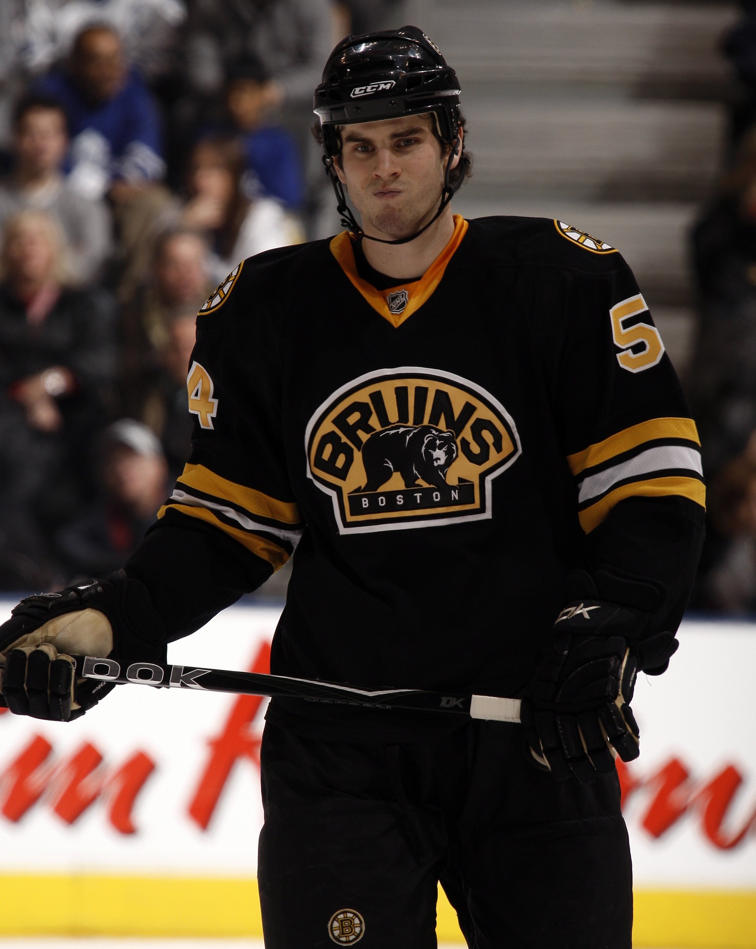 TORONTO - DECEMBER 19:  Adam McQuaid #54 of the Boston Bruinsgets ready for a face-off during his first NHL game on December 19, 2009 against the Toronto Maple Leafs at the Air Canada Centre in Toronto, Ontario, Canada. (Photo by Abelimages/Getty Images)