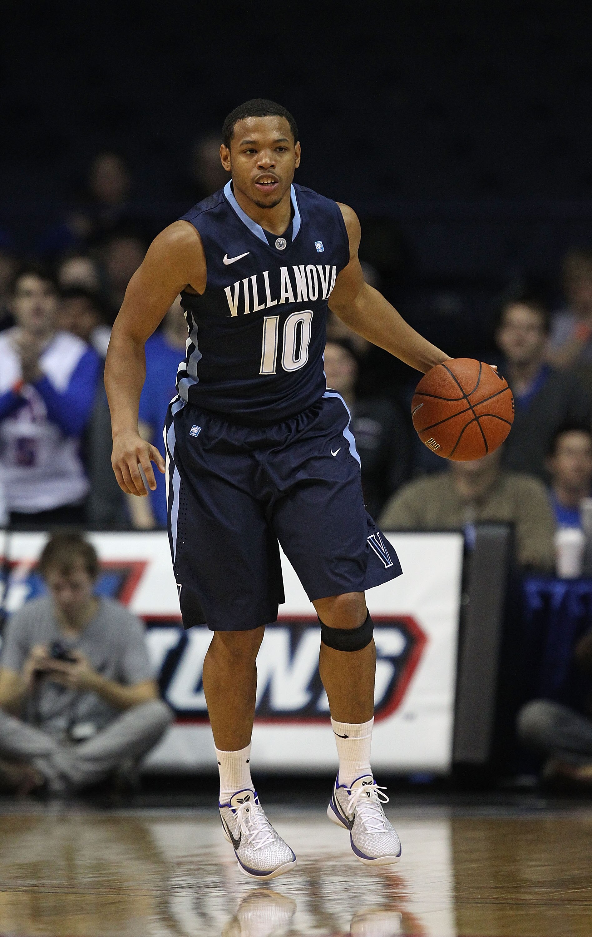 ROSEMONT, IL - FEBRUARY 19: Corey Fisher #10 of the Villanova Wildcats brings the ball up the court against the DePaul Blue Demons at the Allstate Arena on February 19, 2011 in Rosemont, Illinois. Villanova defeated DePaul 77-75 in overtime. (Photo by Jon